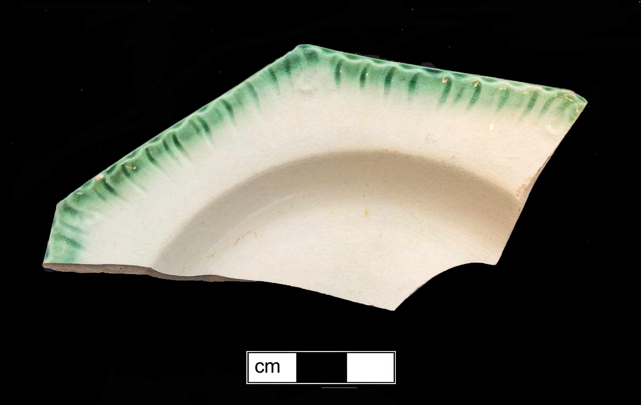Image of edged earthenware fragment.