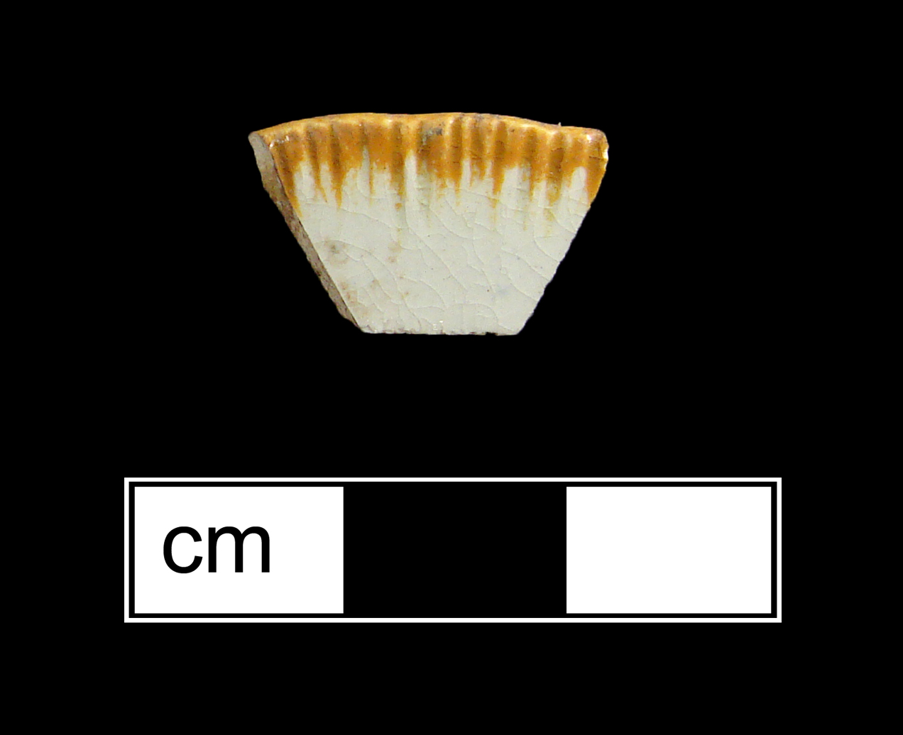 Image of edged earthenware fragment.
