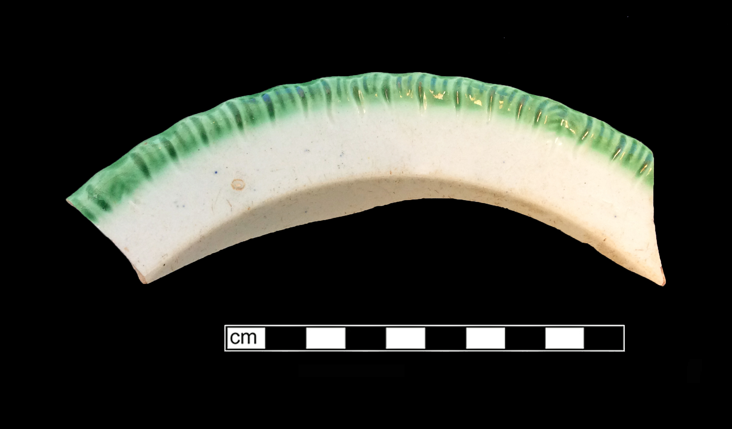 Image of edged earthenware fragment.
