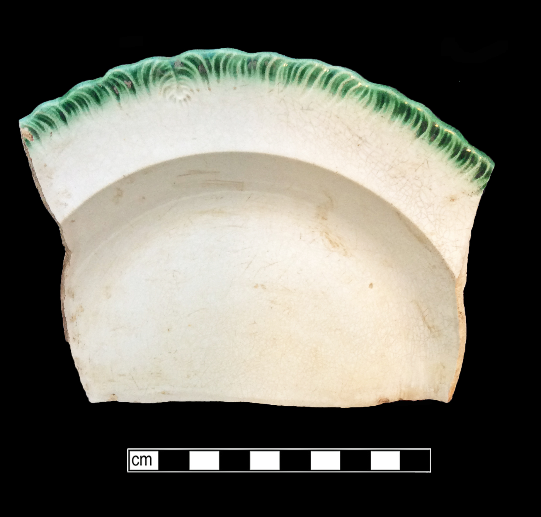 Image of edged earthenware fragment.