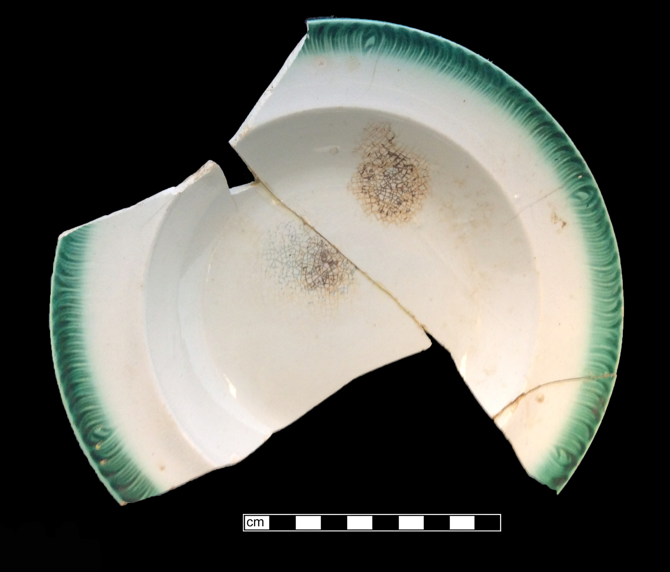 Image of edged earthenware fragment.