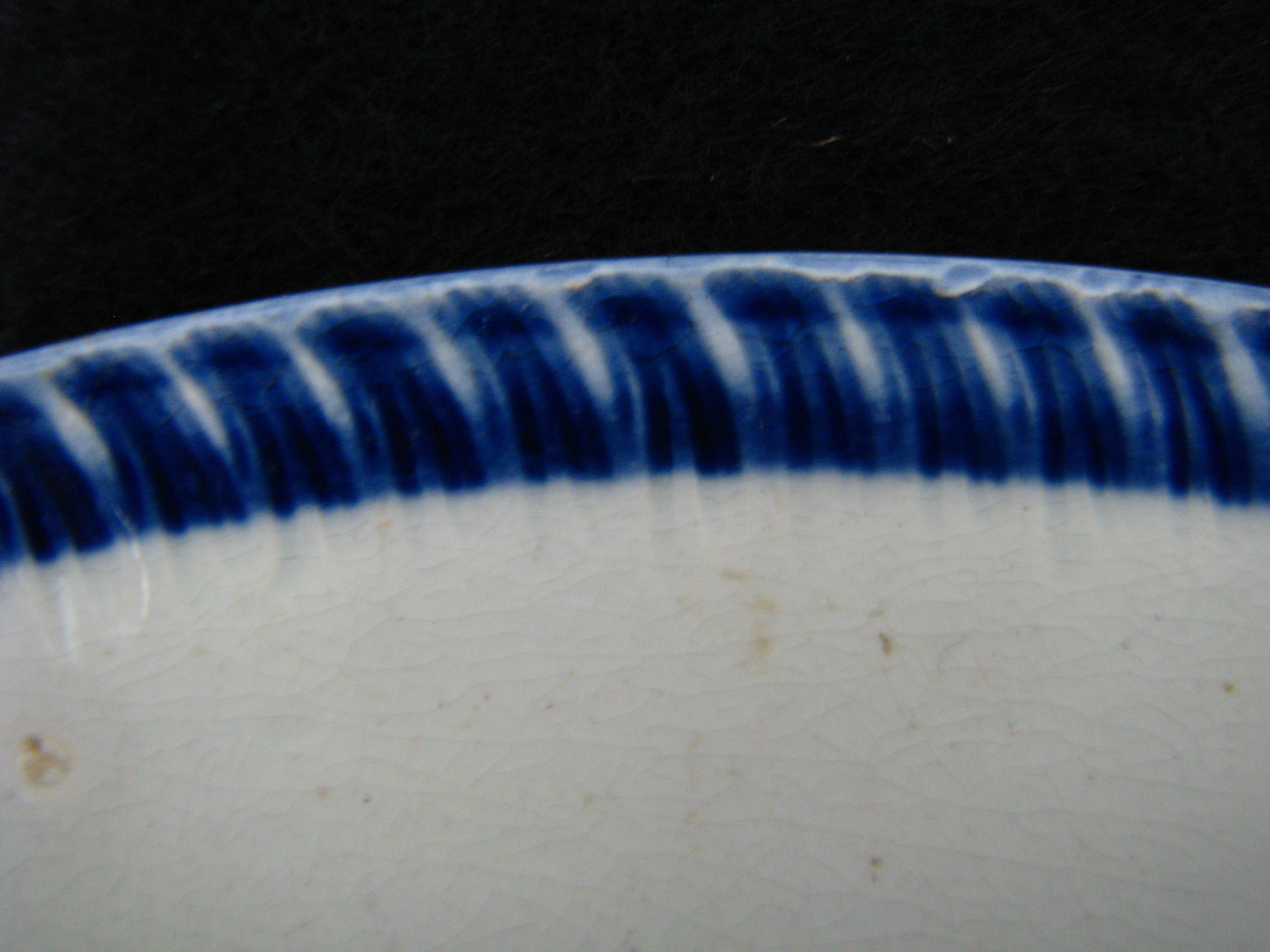 Image of edged earthenware fragment.
