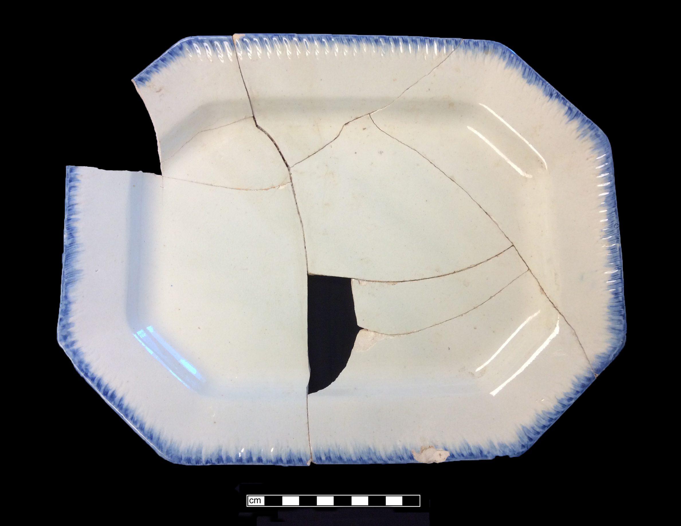 Image of edged earthenware fragment.