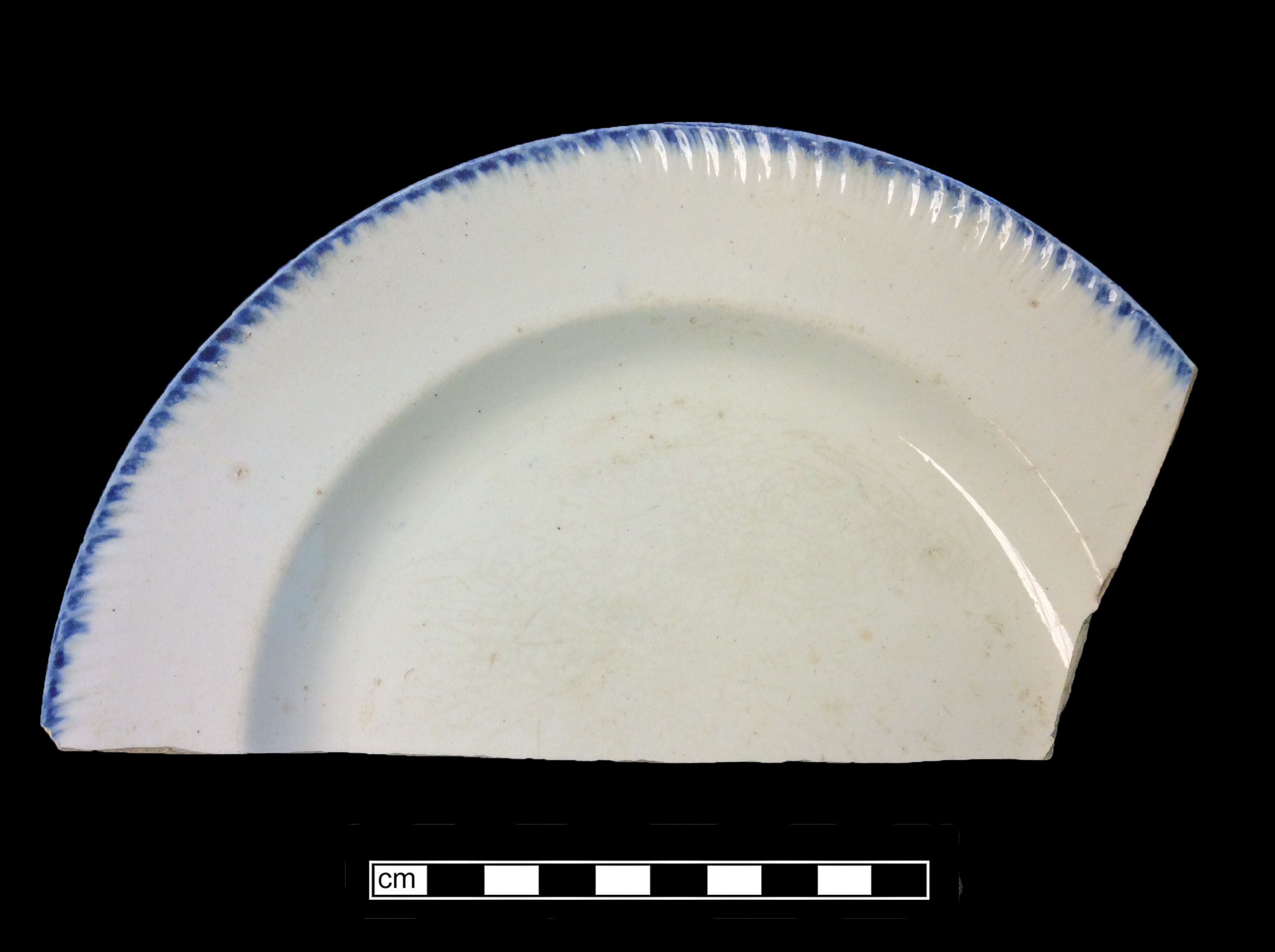 Image of edged earthenware fragment.