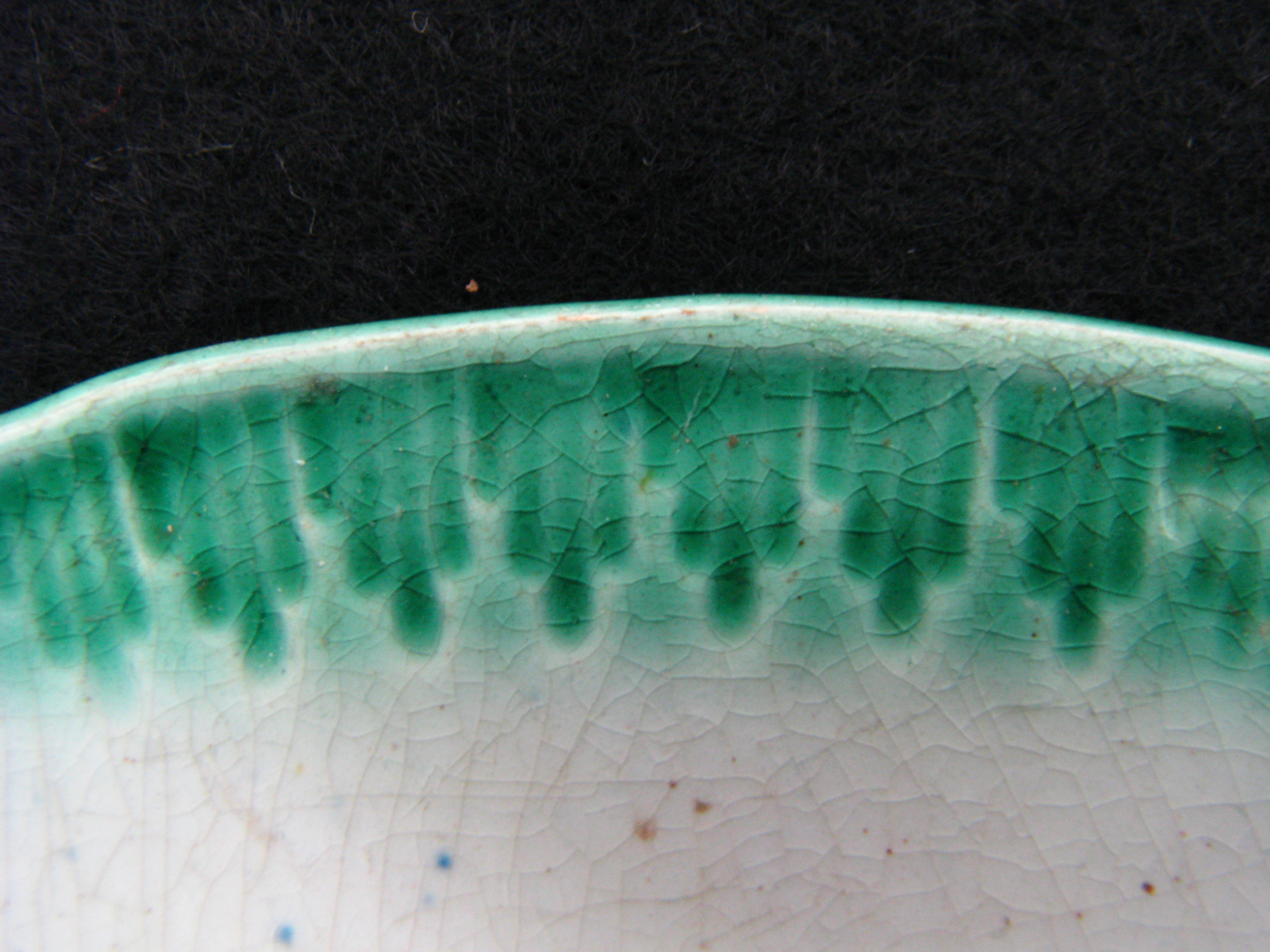 Image of edged earthenware fragment.