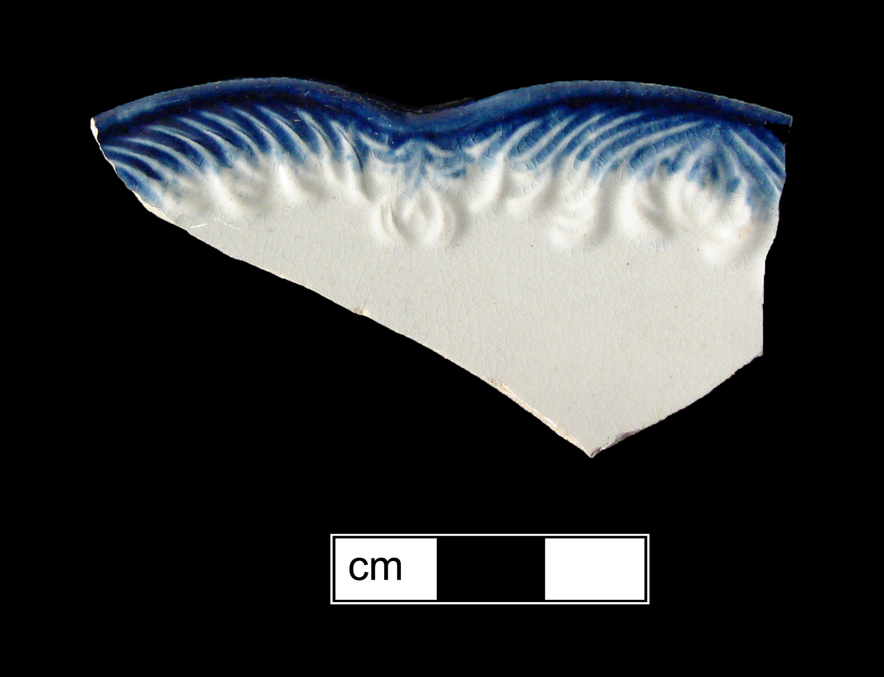 Image of edged earthenware fragment.
