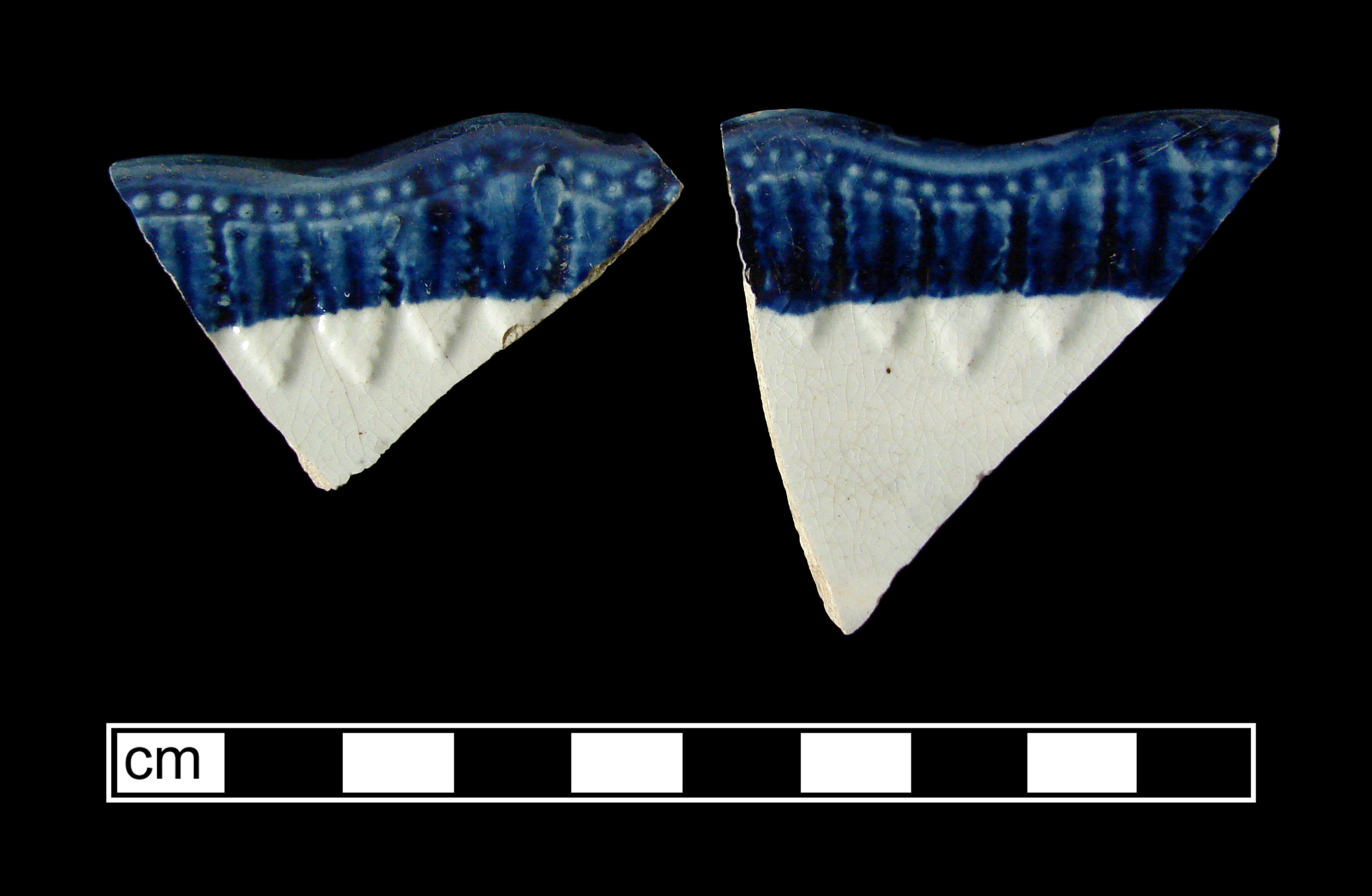 Image of edged earthenware fragment.