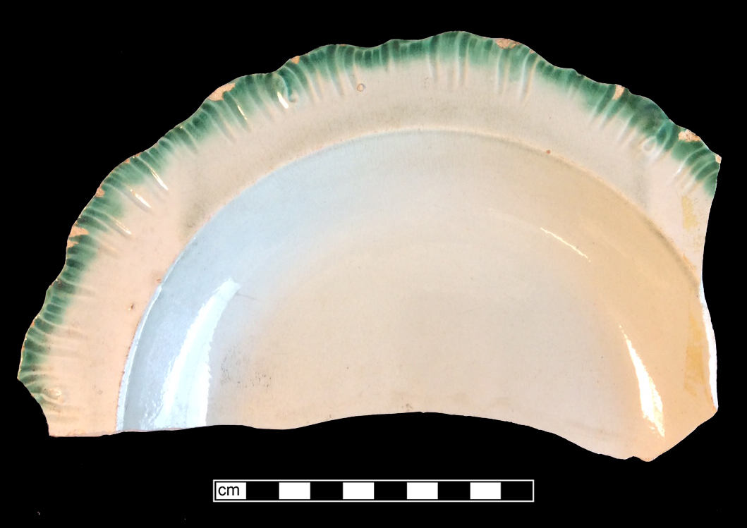 Image of edged earthenware fragment.