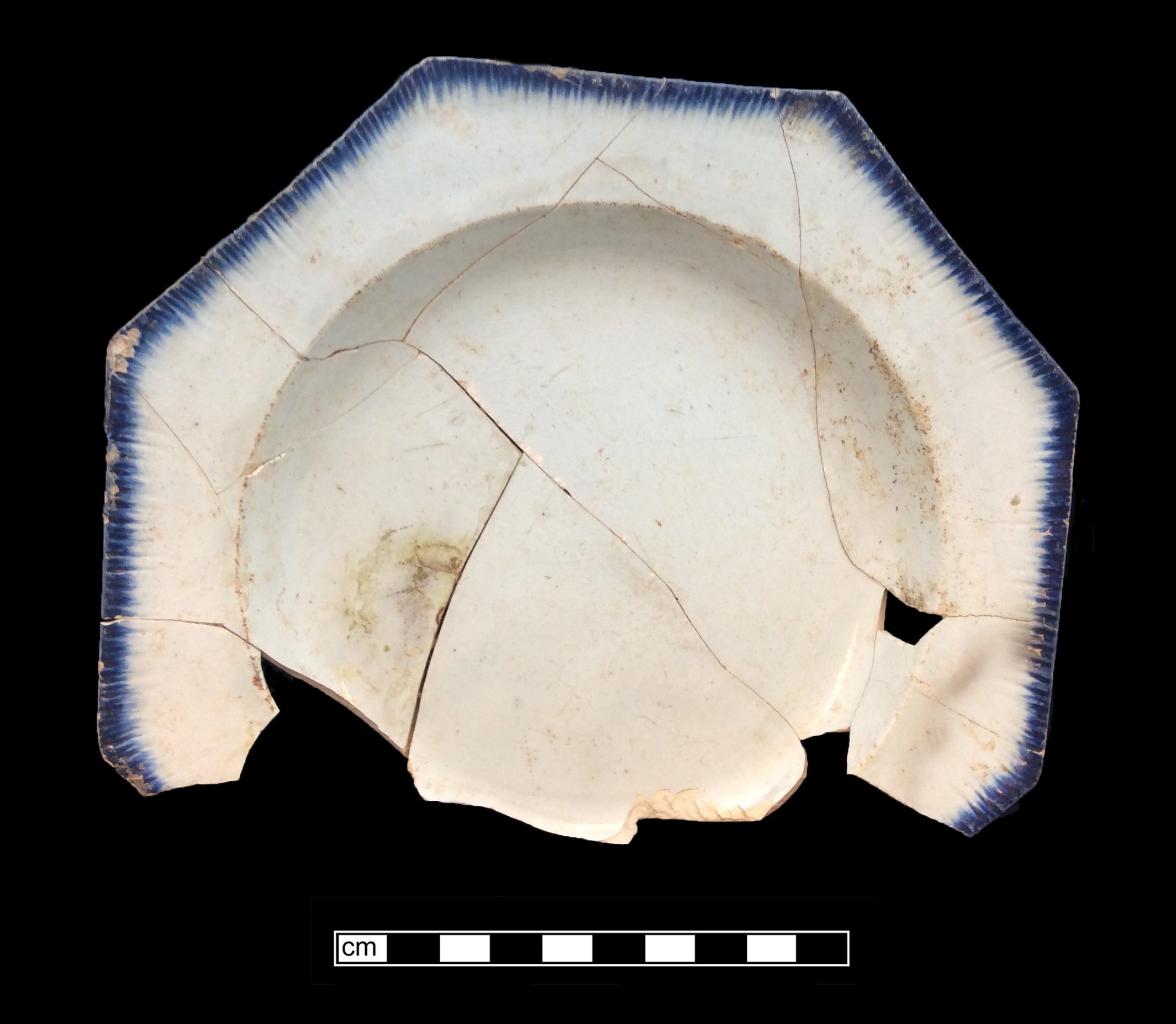 Image of edged earthenware fragment.