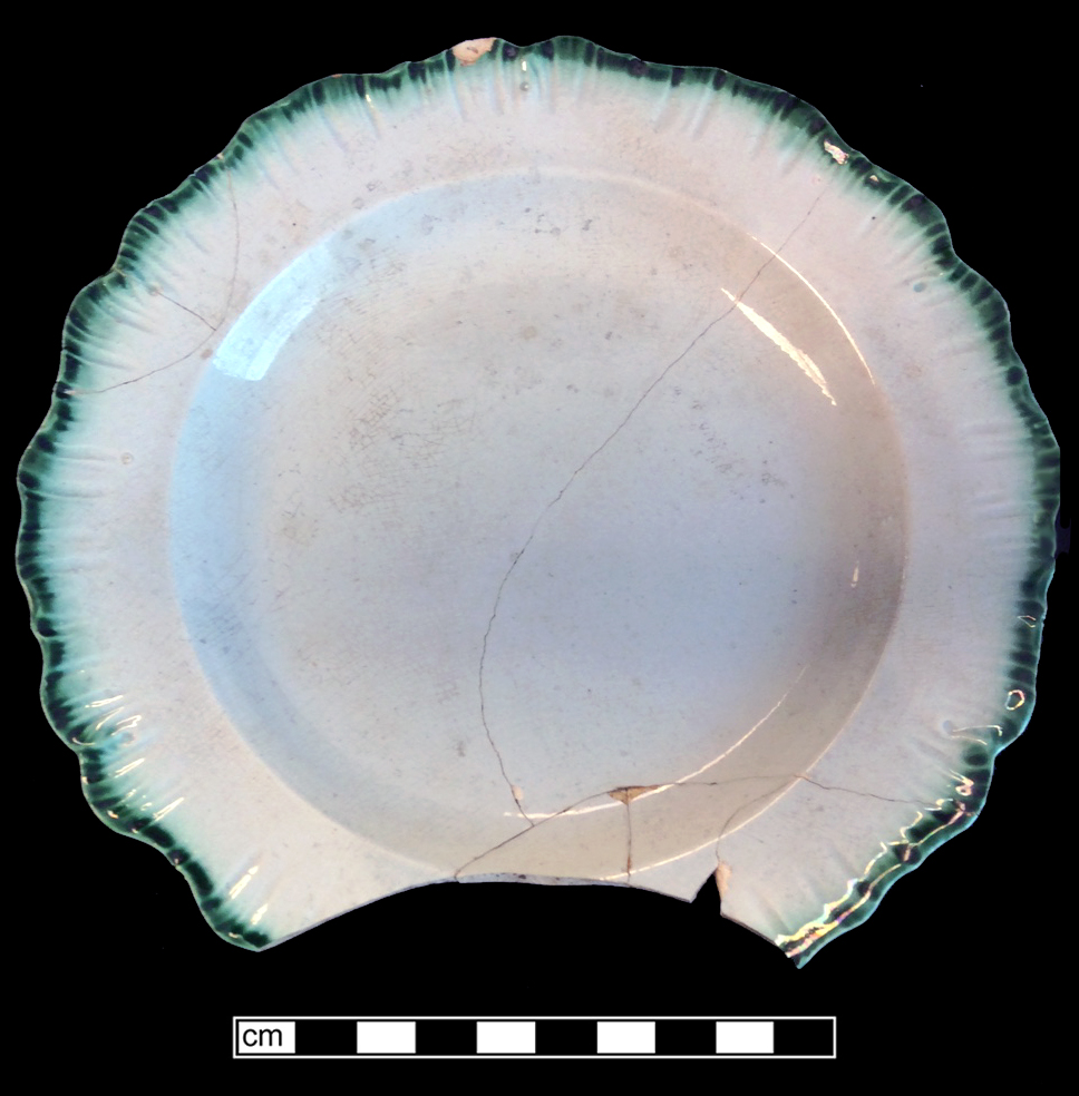 Image of edged earthenware fragment.