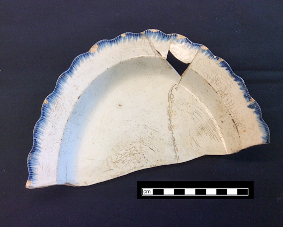 Image of edged earthenware fragment.