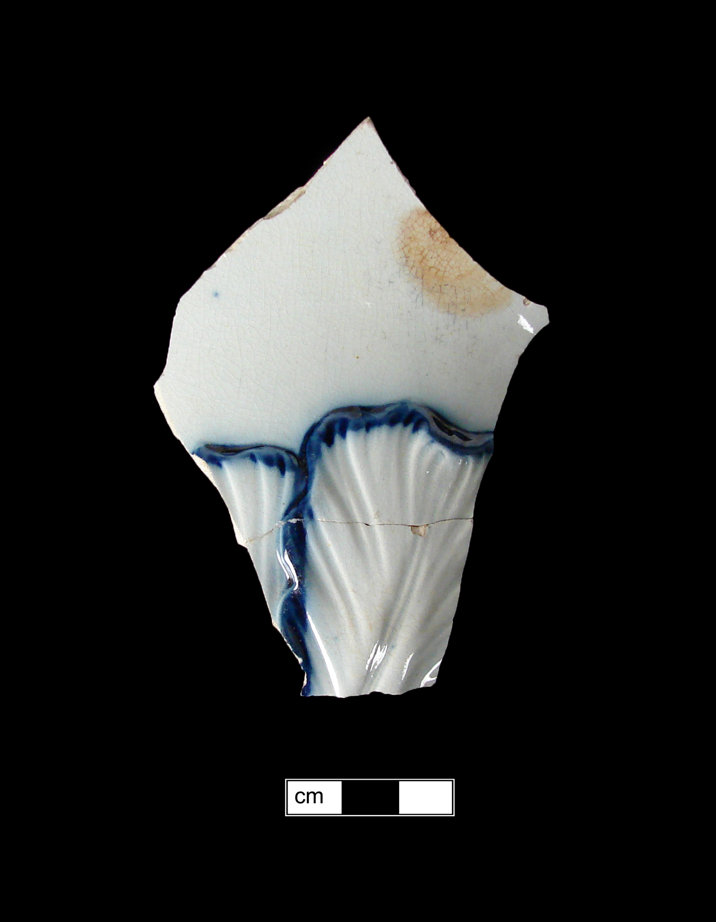 Image of edged earthenware fragment.