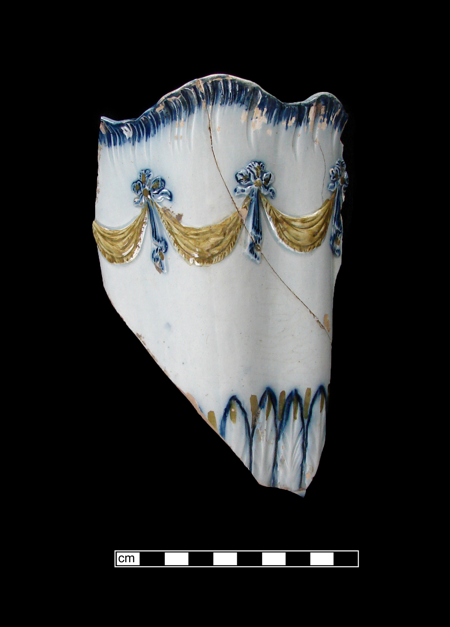 Image of edged earthenware fragment.