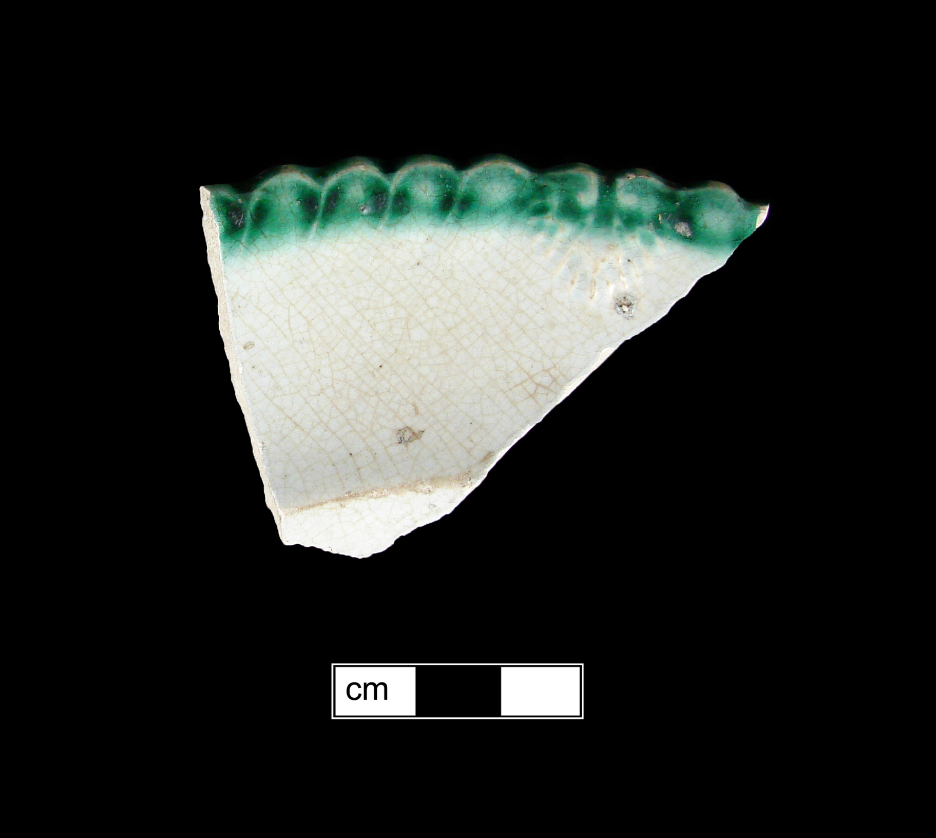 Image of edged earthenware fragment.