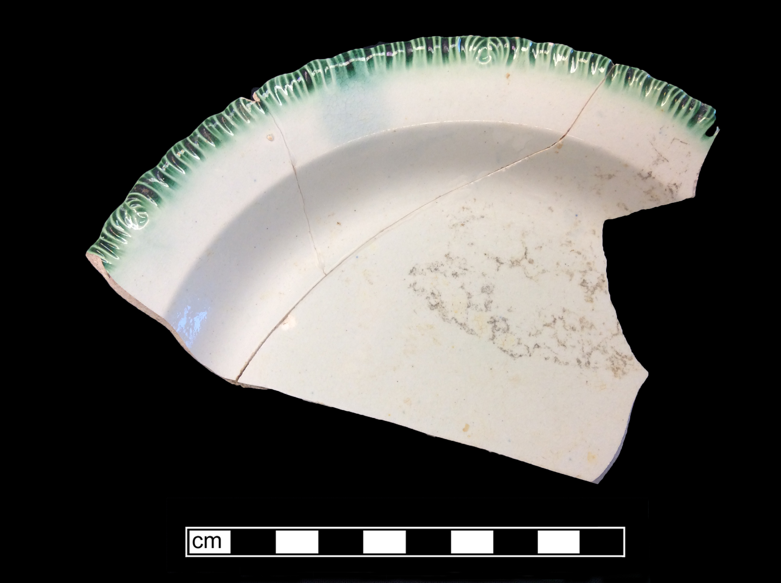 Image of edged earthenware fragment.