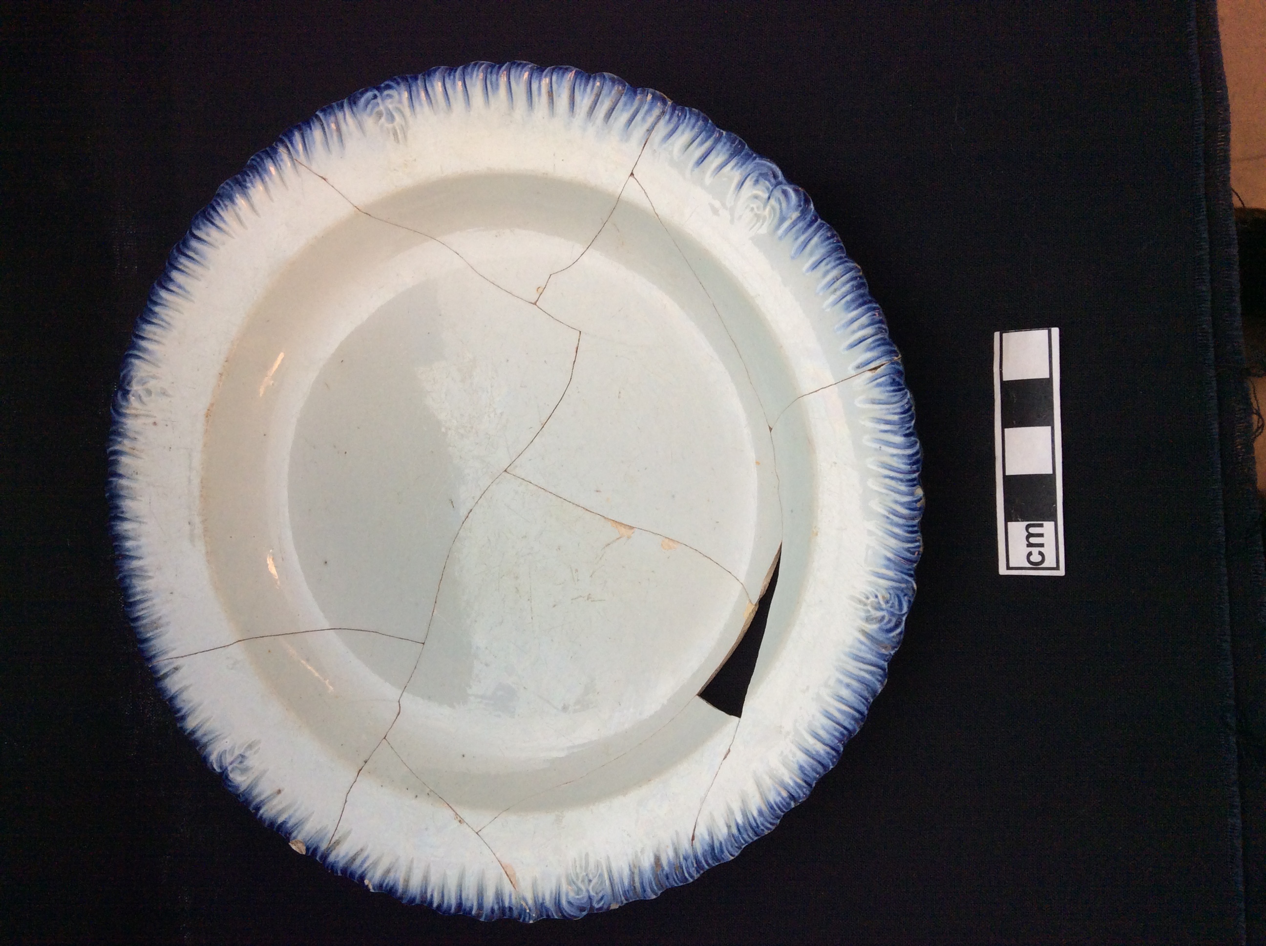 Image of edged earthenware fragment.