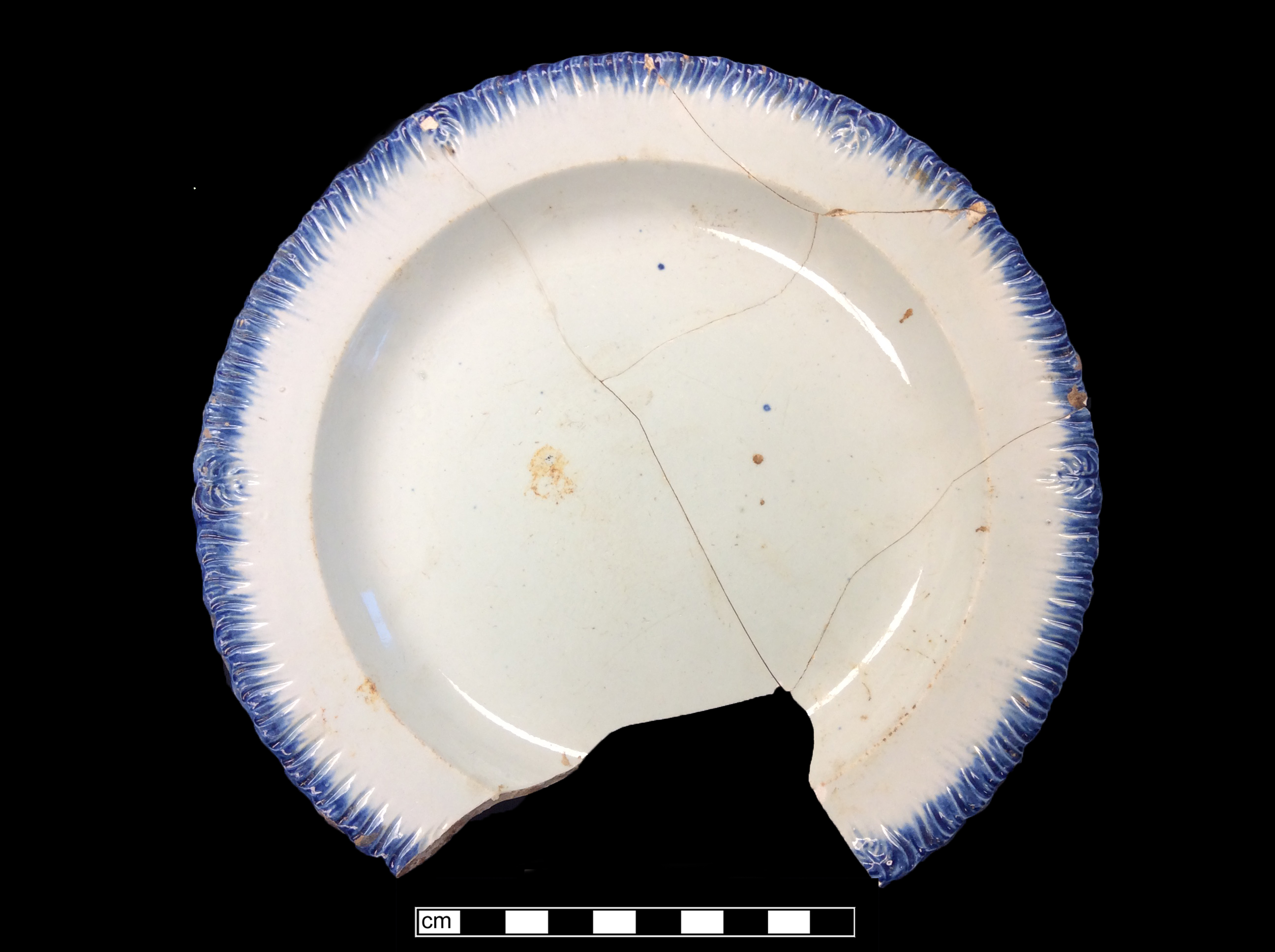 Image of edged earthenware fragment.