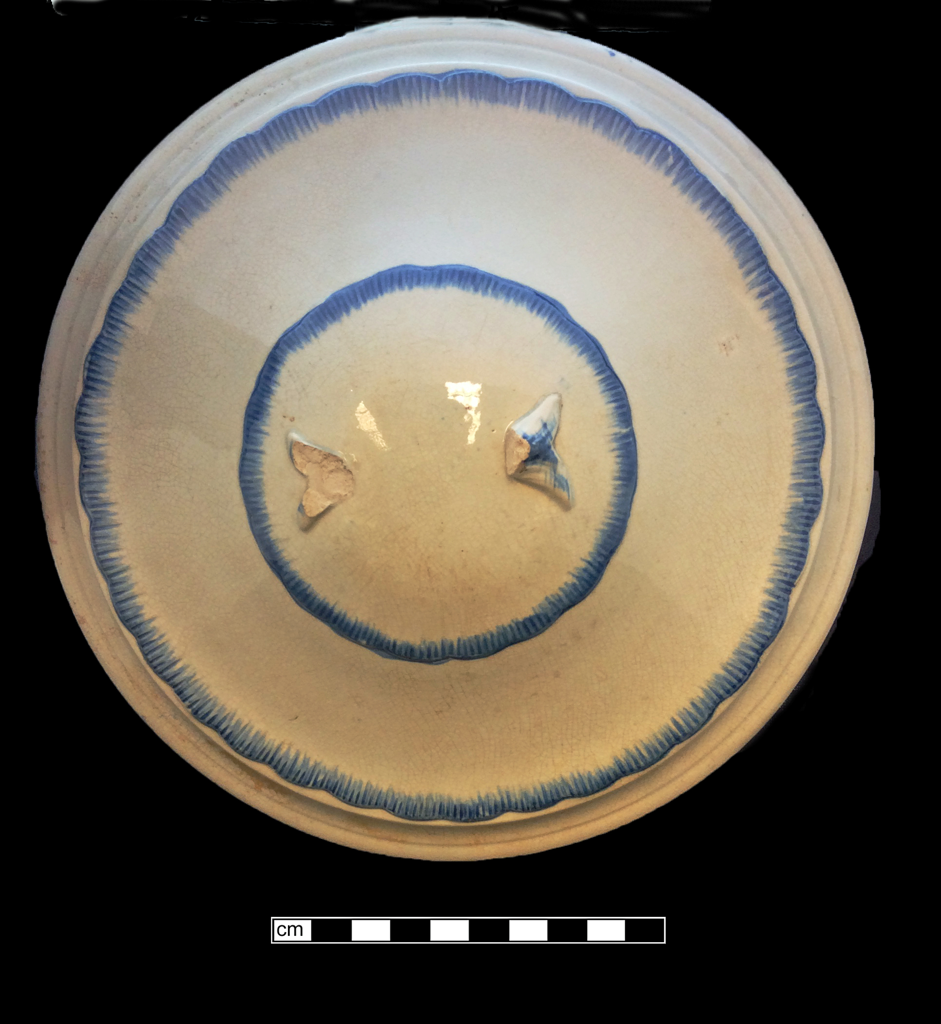 Image of edged earthenware fragment.