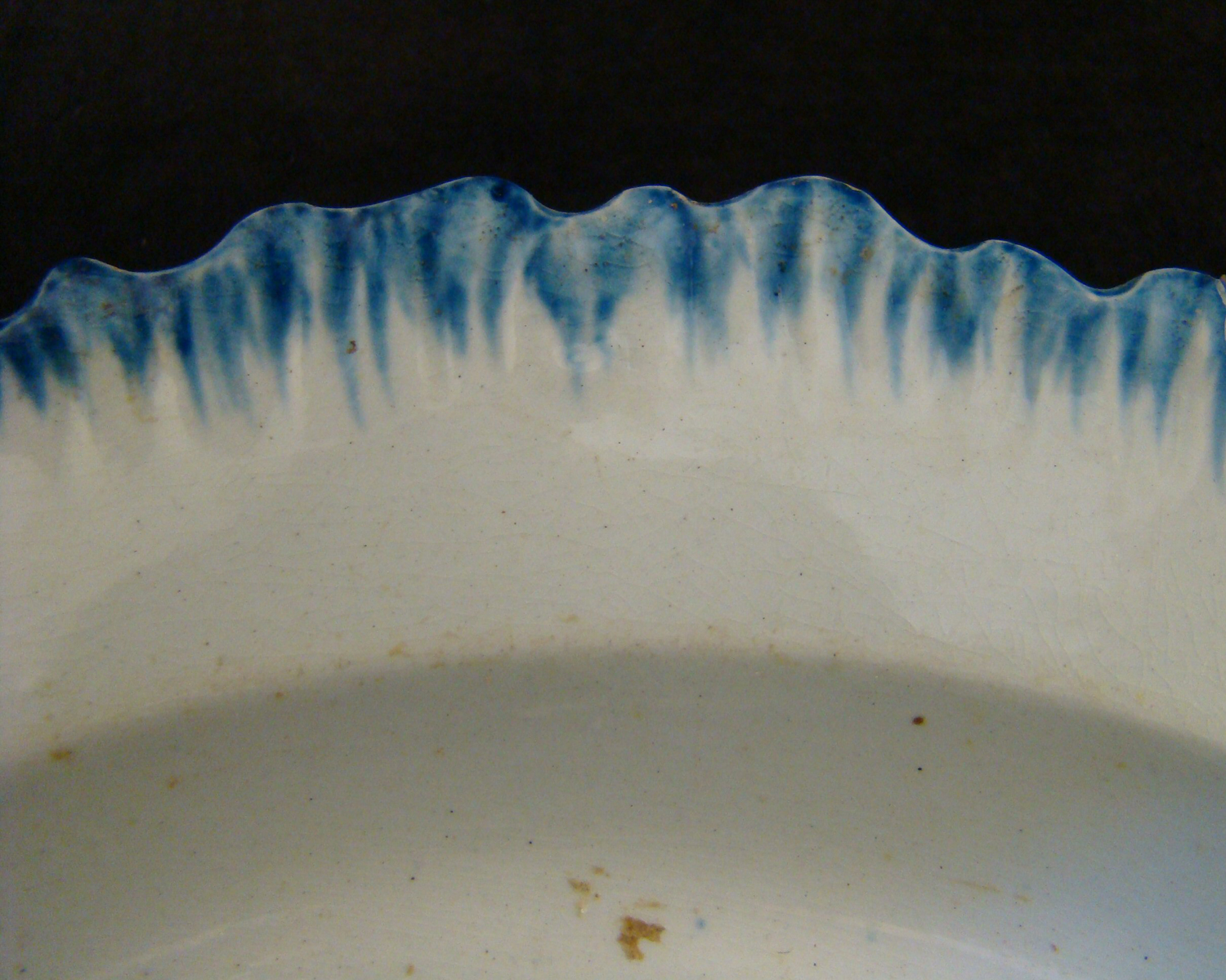 Image of edged earthenware fragment.