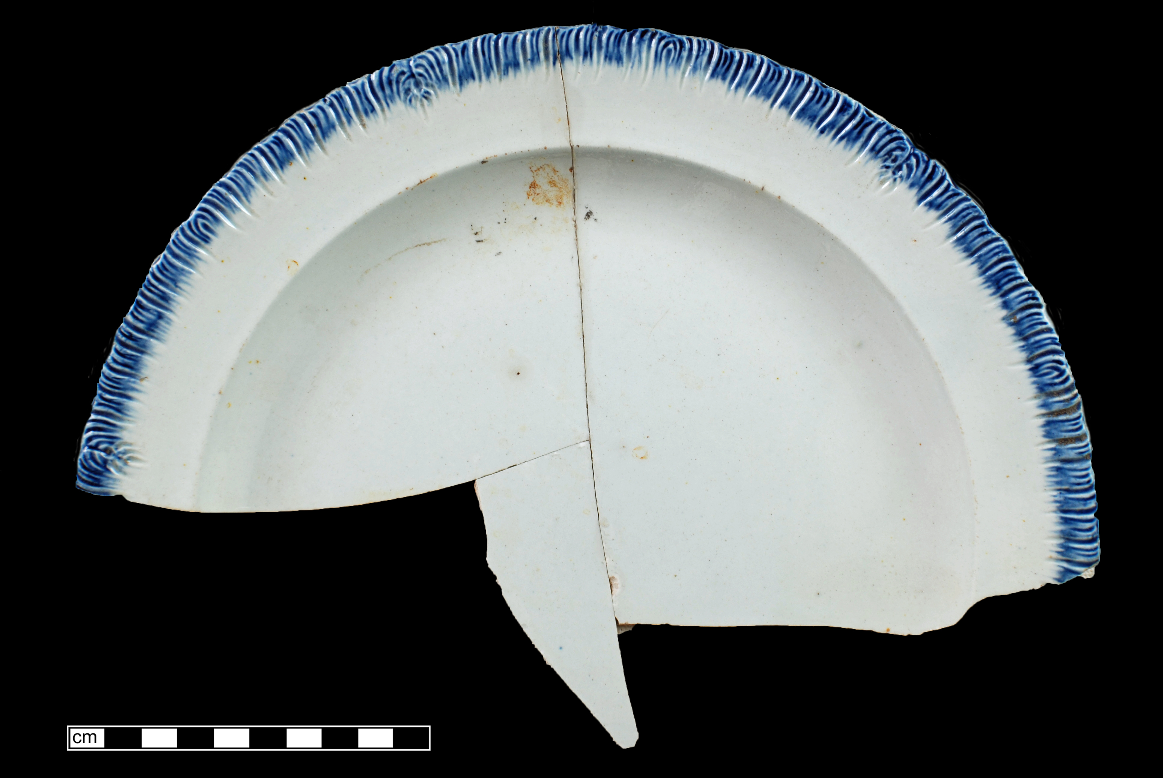 Image of edged earthenware fragment.