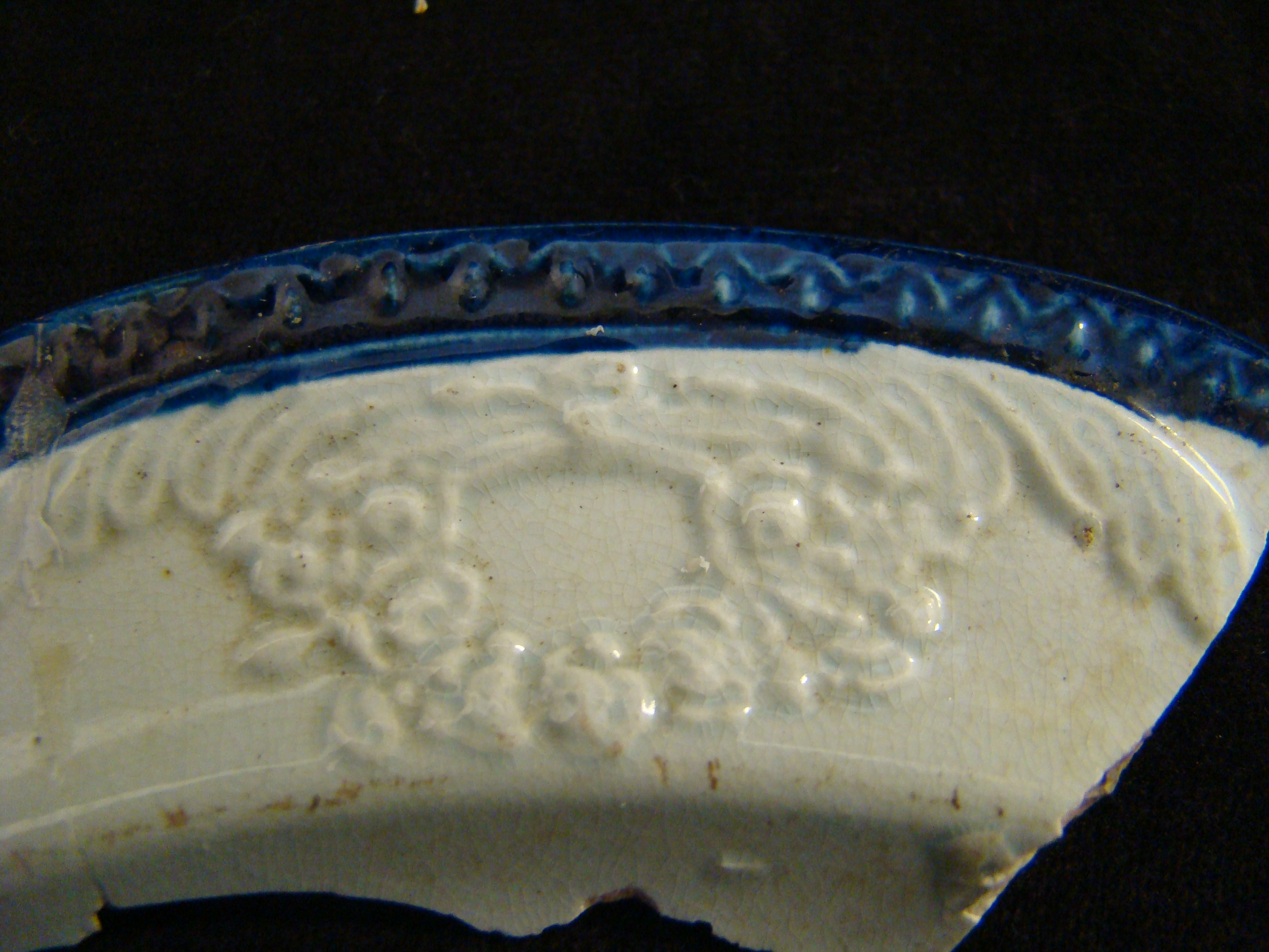 Image of edged earthenware fragment.