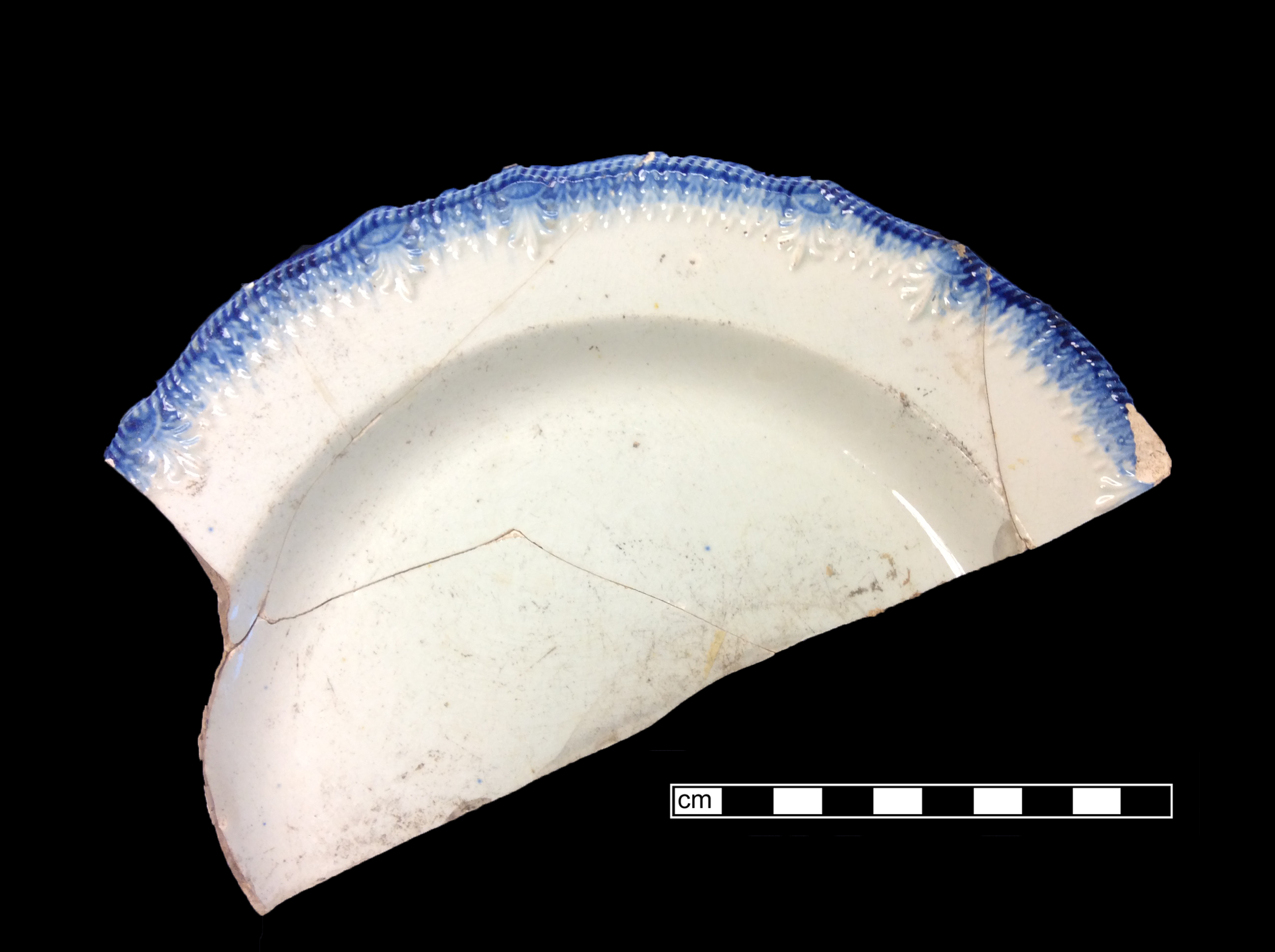 Image of edged earthenware fragment.