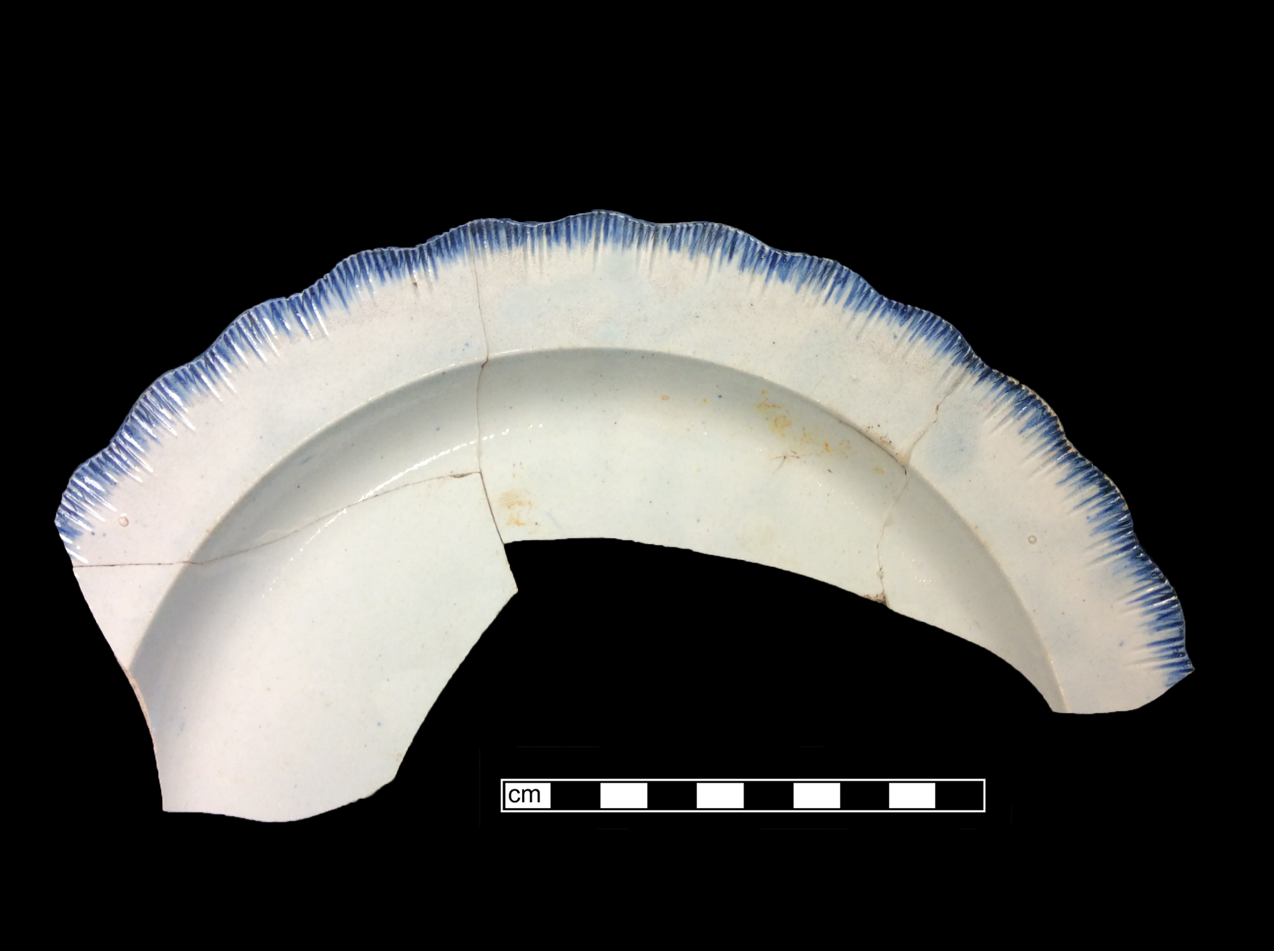 Image of edged earthenware fragment.