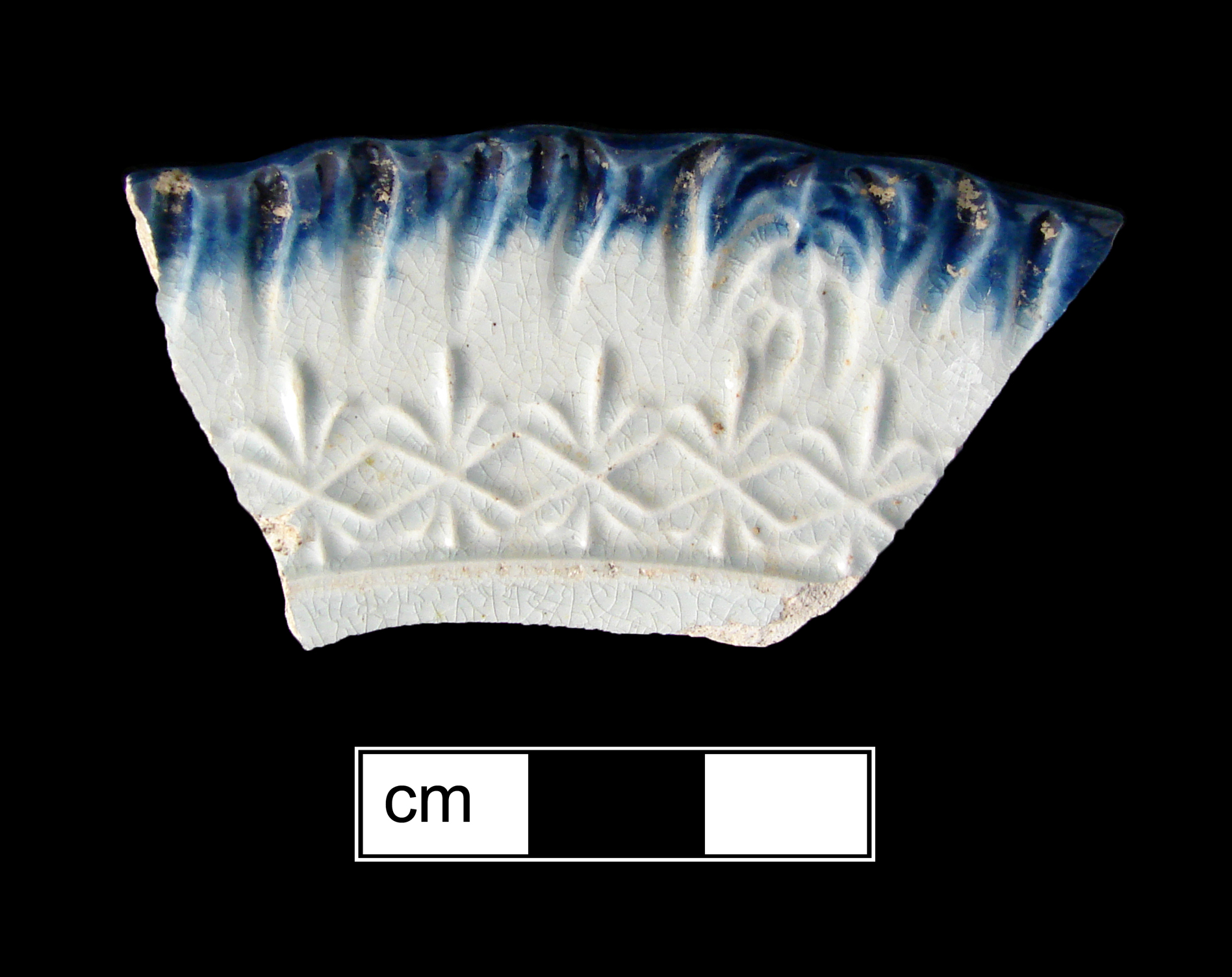 Image of edged earthenware fragment.