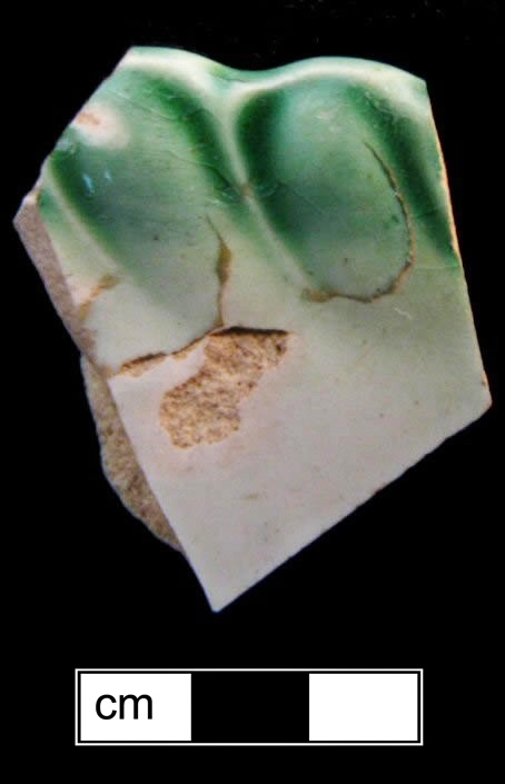 Image of edged earthenware fragment.