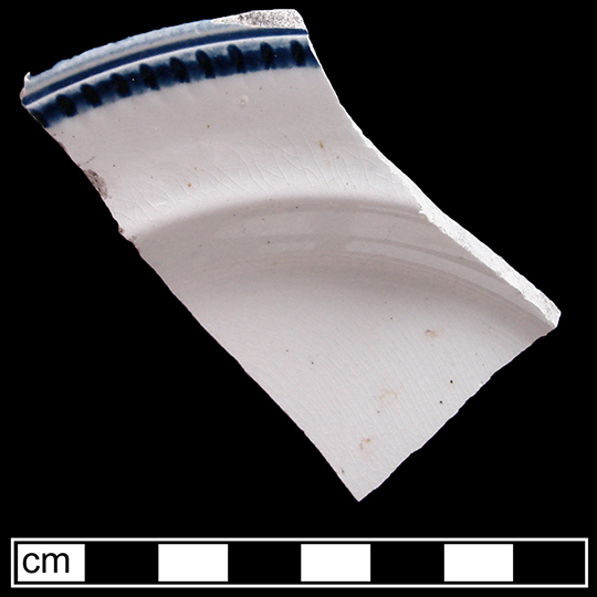 Image of edged earthenware fragment.