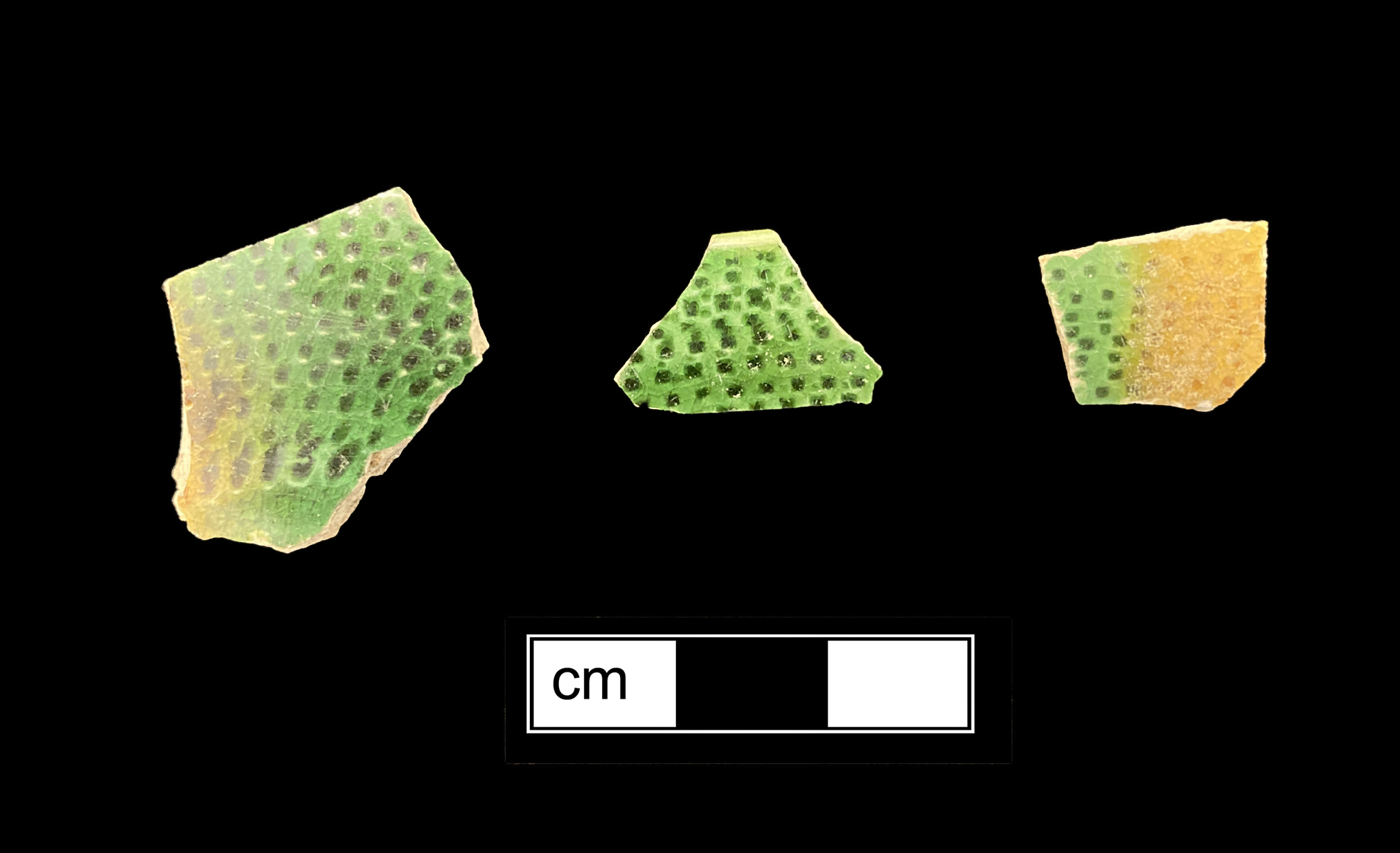 Image of green glazed earthenware fragment.