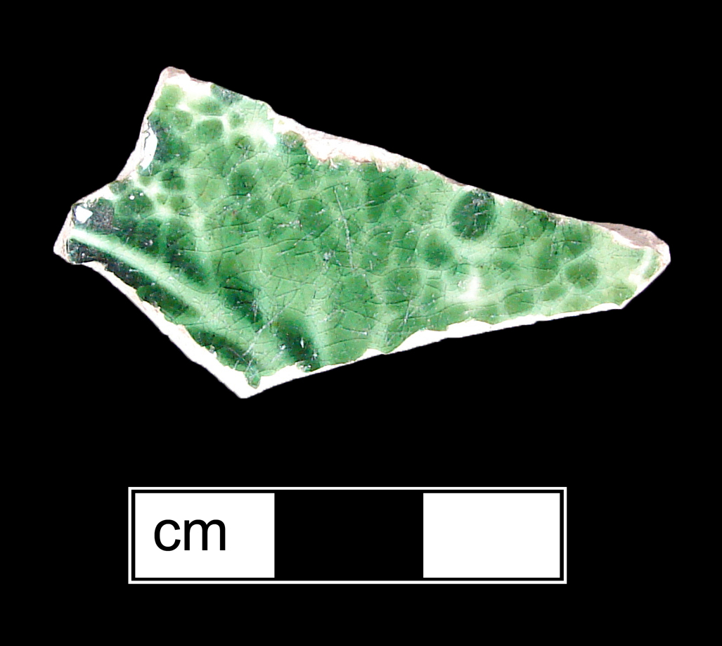 Image of green glazed earthenware fragment.