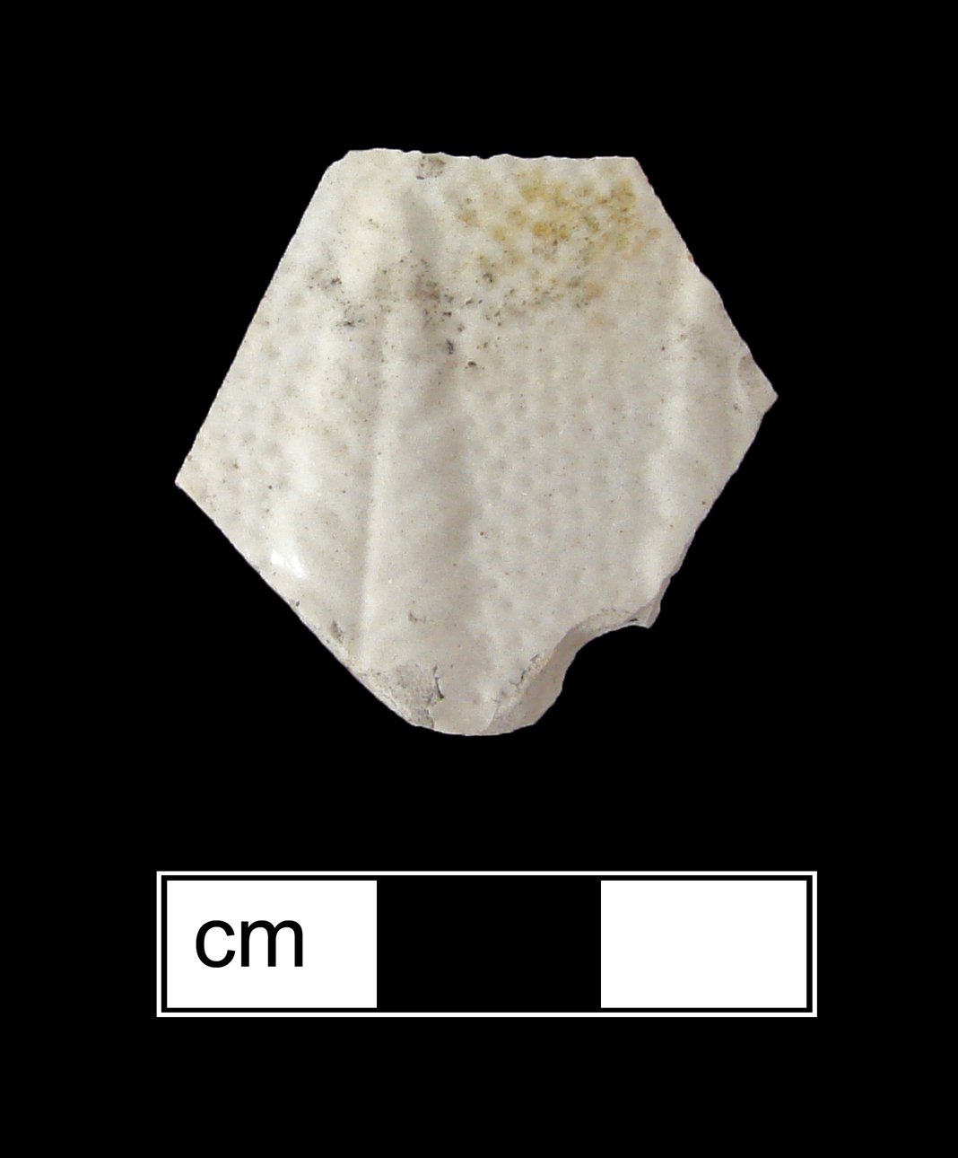 Image of green glazed earthenware fragment.