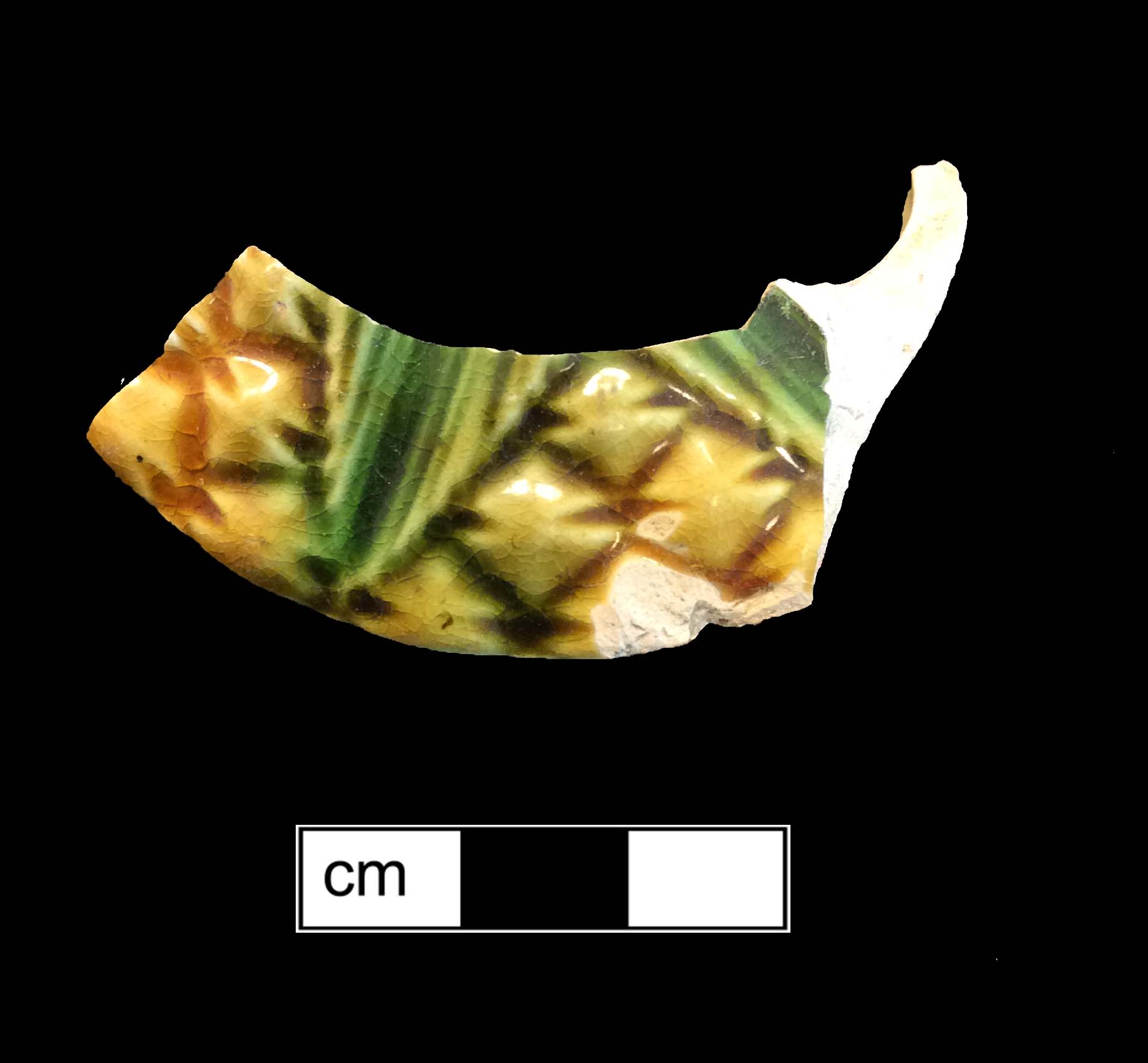 Image of green glazed earthenware fragment.
