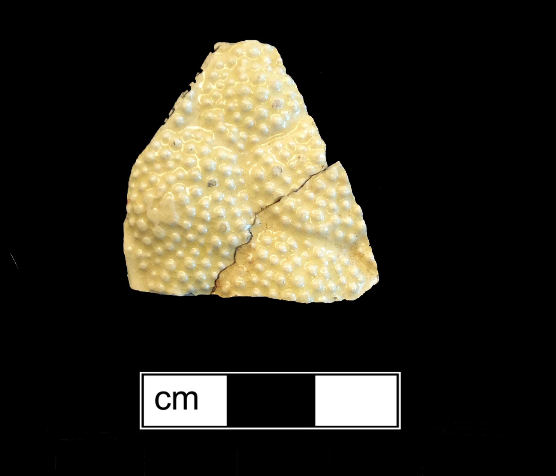 Image of green glazed earthenware fragment.