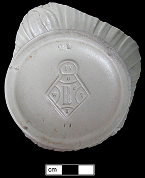 Image of relief molded stoneware jug fragment.