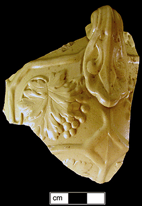 Image of relief molded stoneware jug fragment.