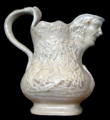 Image of relief molded stoneware jug fragment.