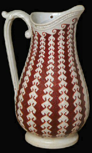 Image of relief molded stoneware jug fragment.