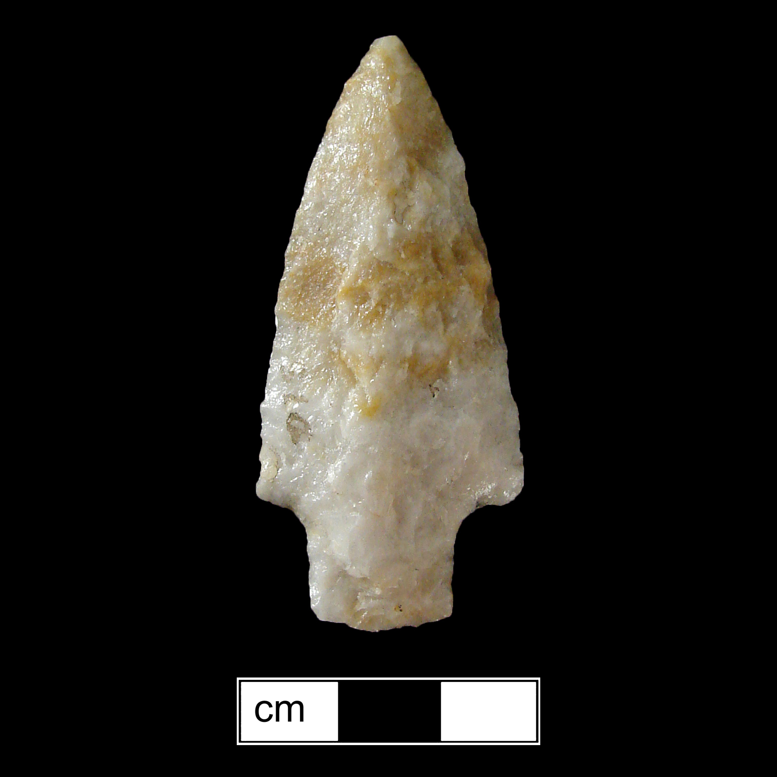 Image of stone projectile point made of Quartz, Stemmed shape, with a Straight stem, Excurvate blade, and Convex base shape. Bare Island type.