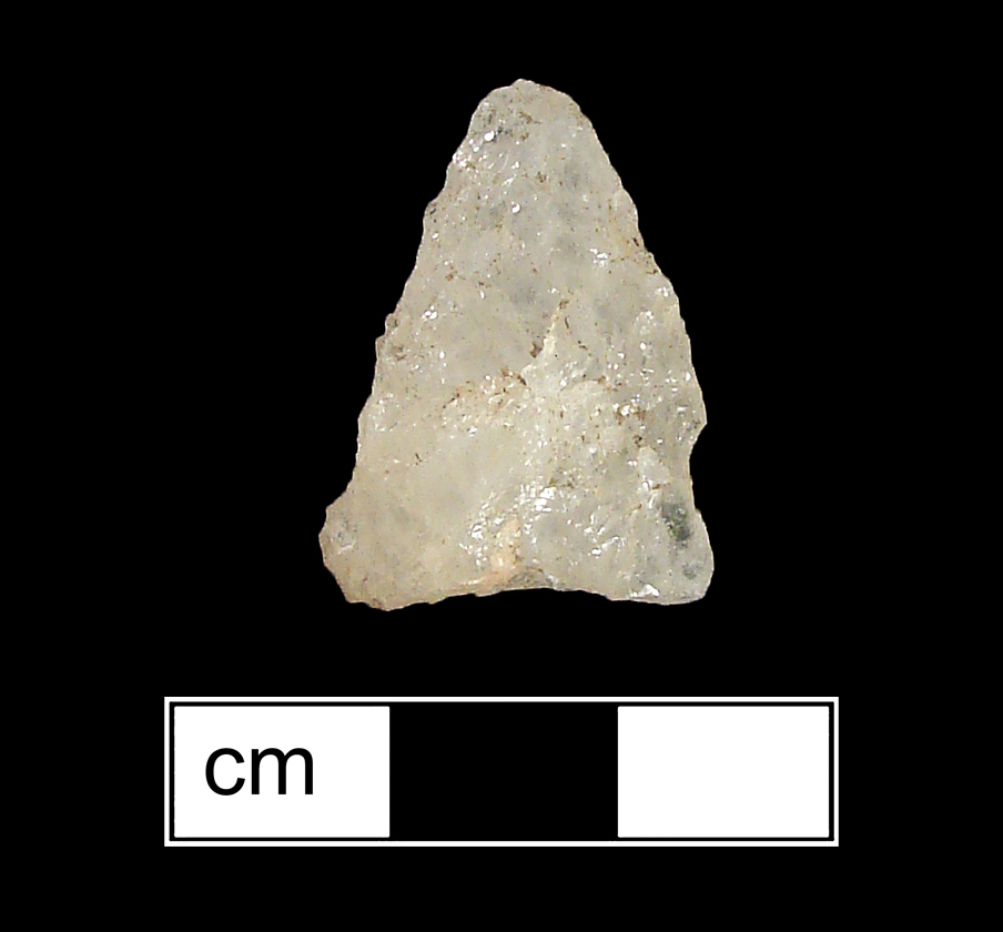 Image of stone projectile point made of Quartz, Side-Notched shape, with a N/A stem, Straight blade, and Concave base shape. Brewerton Eared Notched type.