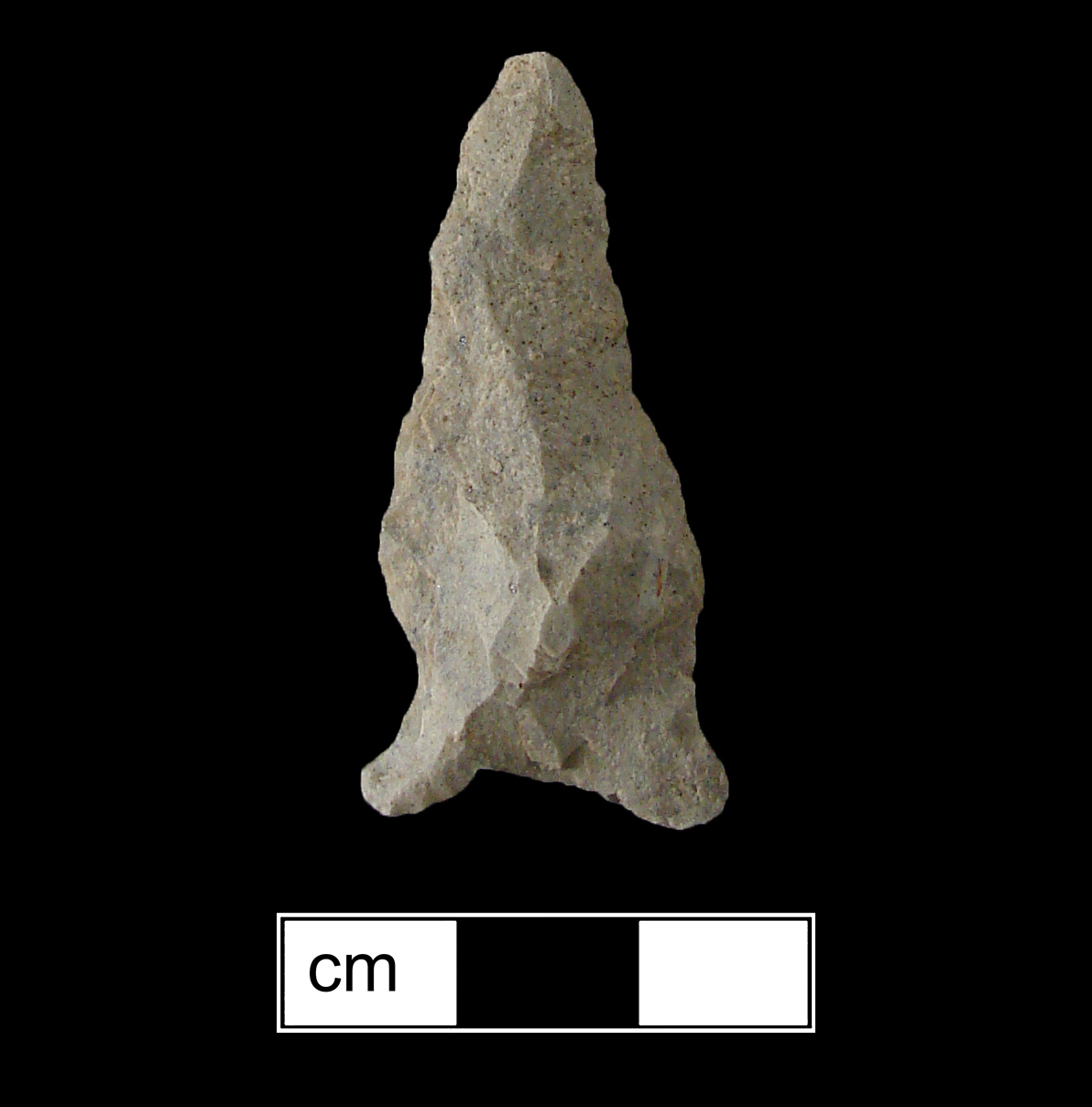 Image of stone projectile point made of Rhyolite, Side-Notched shape, with a Expanding stem, Straight blade, and Concave base shape. Brewerton Eared Notched type.