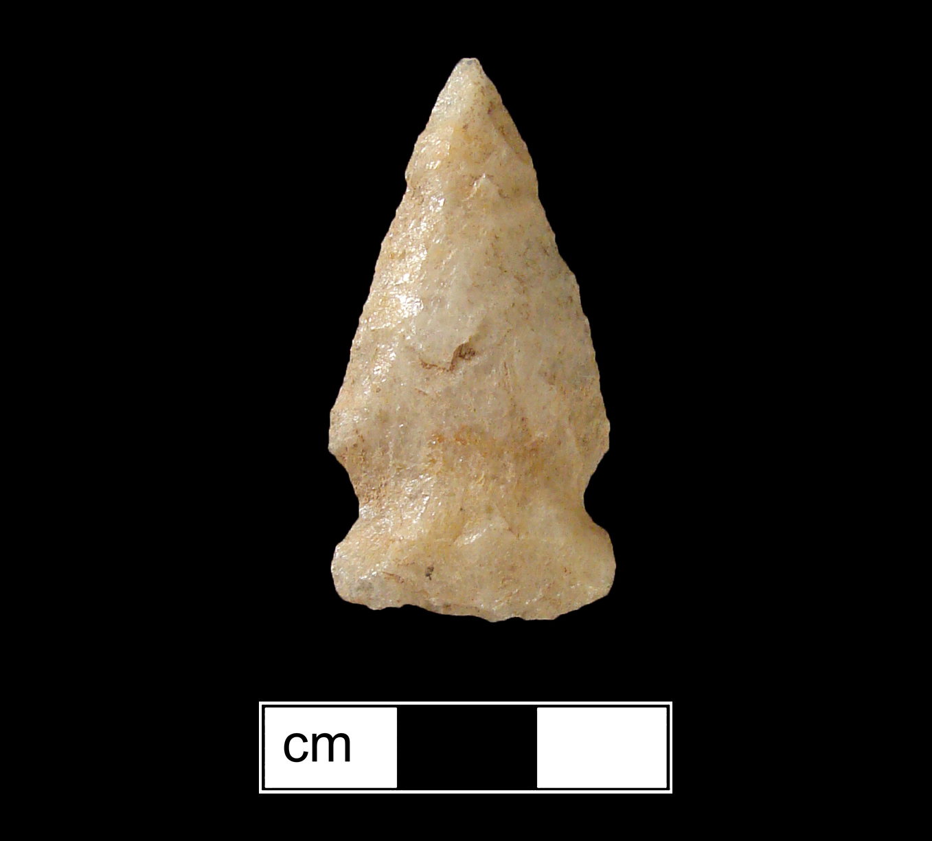 Image of stone projectile point made of Quartz, Side-Notched shape, with a Expanding stem, Straight blade, and Straight base shape. Brewerton Side Notched type.