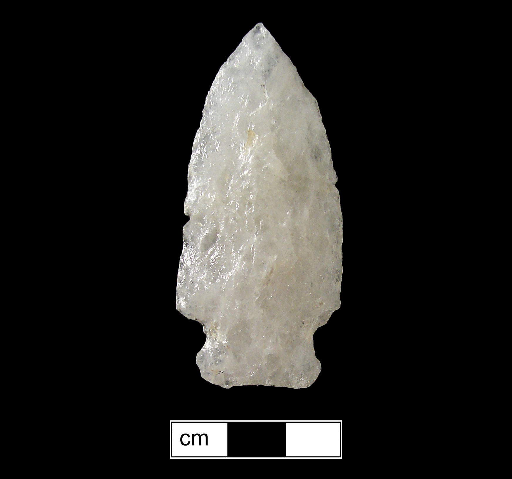 Image of stone projectile point made of Quartz, Side-Notched shape, with a Expanding stem, Excurvate blade, and Concave base shape. Brewerton Side Notched type.