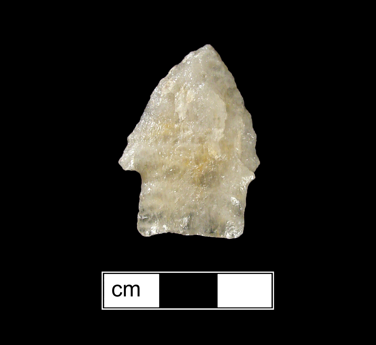 Image of stone projectile point made of Quartz, Stemmed shape, with a Straight stem, Excurvate blade, and Straight base shape. Calvert type.