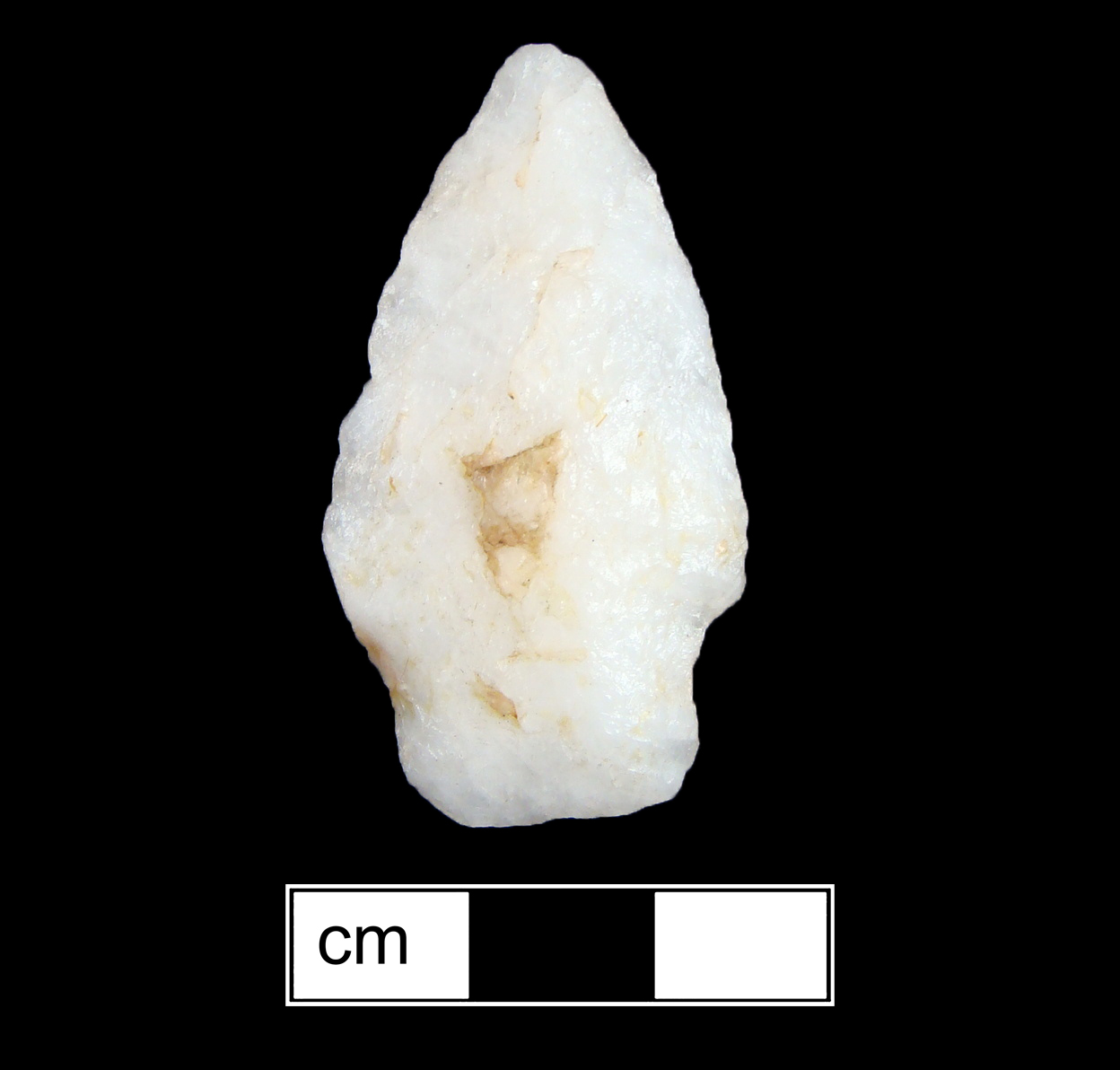 Image of stone projectile point made of Quartz, Stemmed shape, with a Straight stem, Excurvate blade, and Straight base shape. Calvert type.