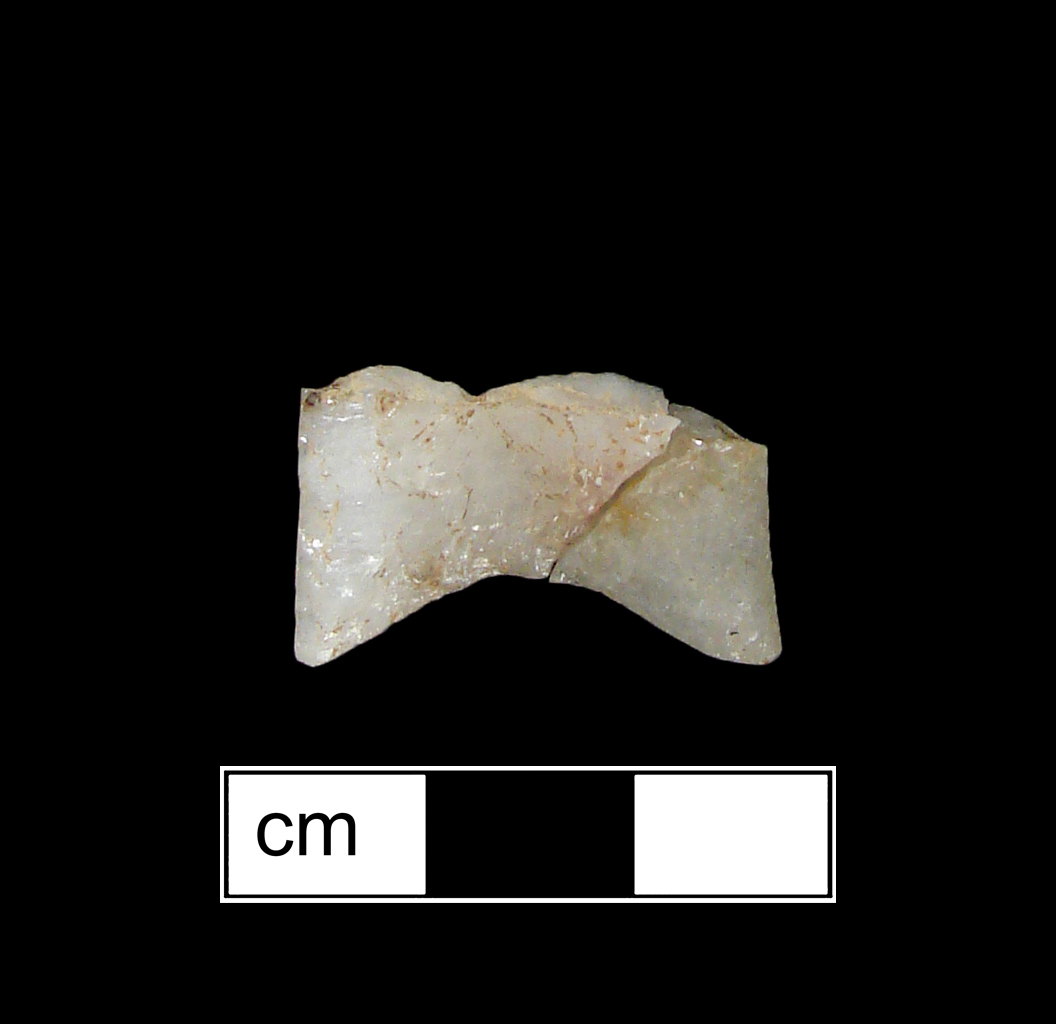 Image of stone projectile point made of Quartz, Lanceolate shape, with a N/A stem, Unknown blade, and Concave base shape. Clovis type.