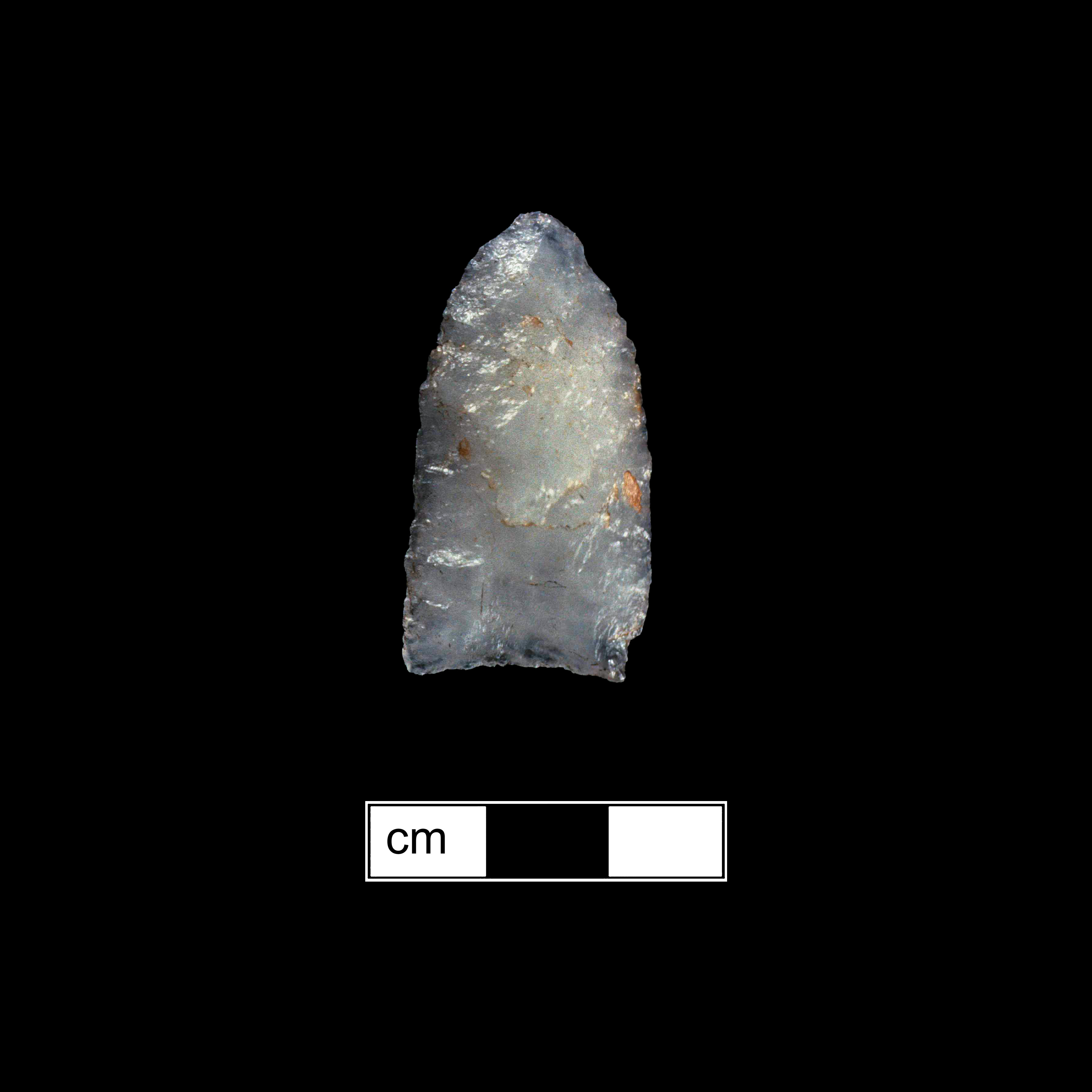 Image of stone projectile point made of Quartz, Lanceolate shape, with a N/A stem, Straight blade, and Concave base shape. Clovis type.