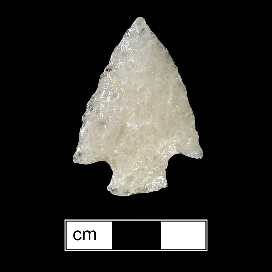 Image of stone projectile point made of Quartz, Corner-Notched shape, with a Expanding stem, Excurvate blade, and Straight base shape. Jacks Reef Corner Notched type.