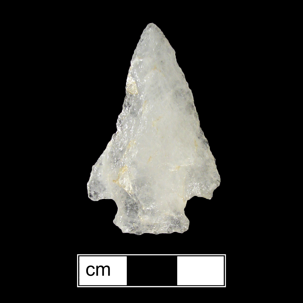 Image of stone projectile point made of Quartz, Corner-Notched shape, with a Expanding stem, Straight blade, and Straight base shape. Kirk Corner Notched type.